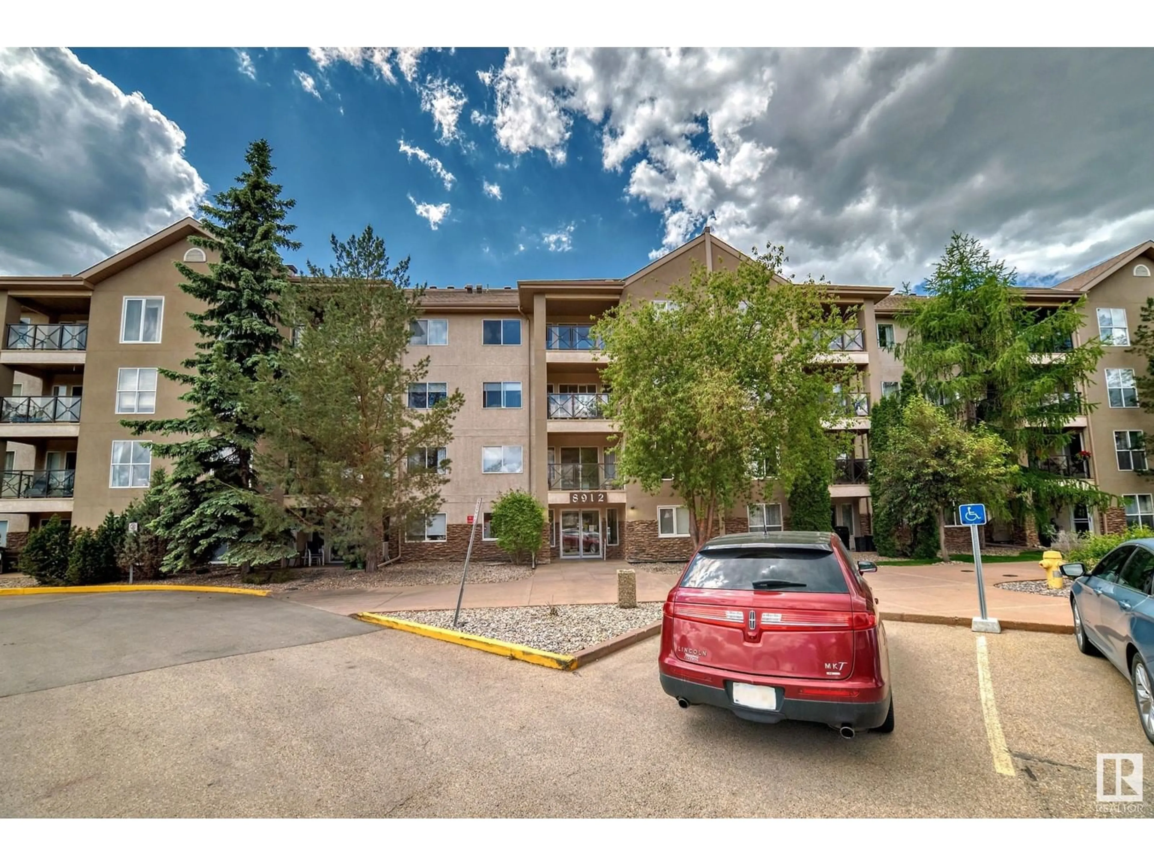 A pic from exterior of the house or condo, the front or back of building for #412 8912 156 ST NW, Edmonton Alberta T5R5Z2