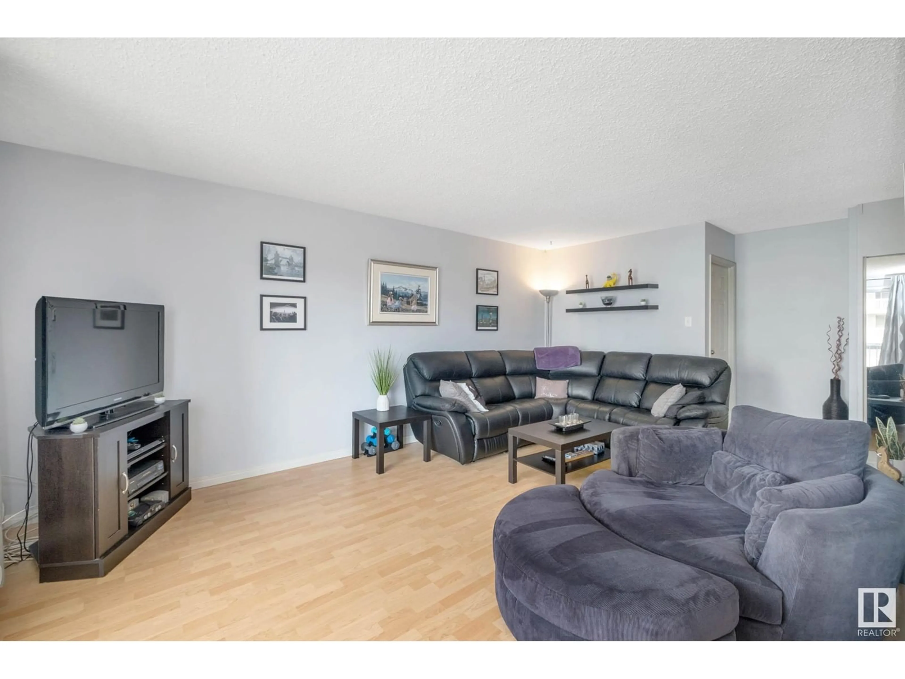 Living room, wood floors for #506 10150 117 ST NW, Edmonton Alberta T5K2J2