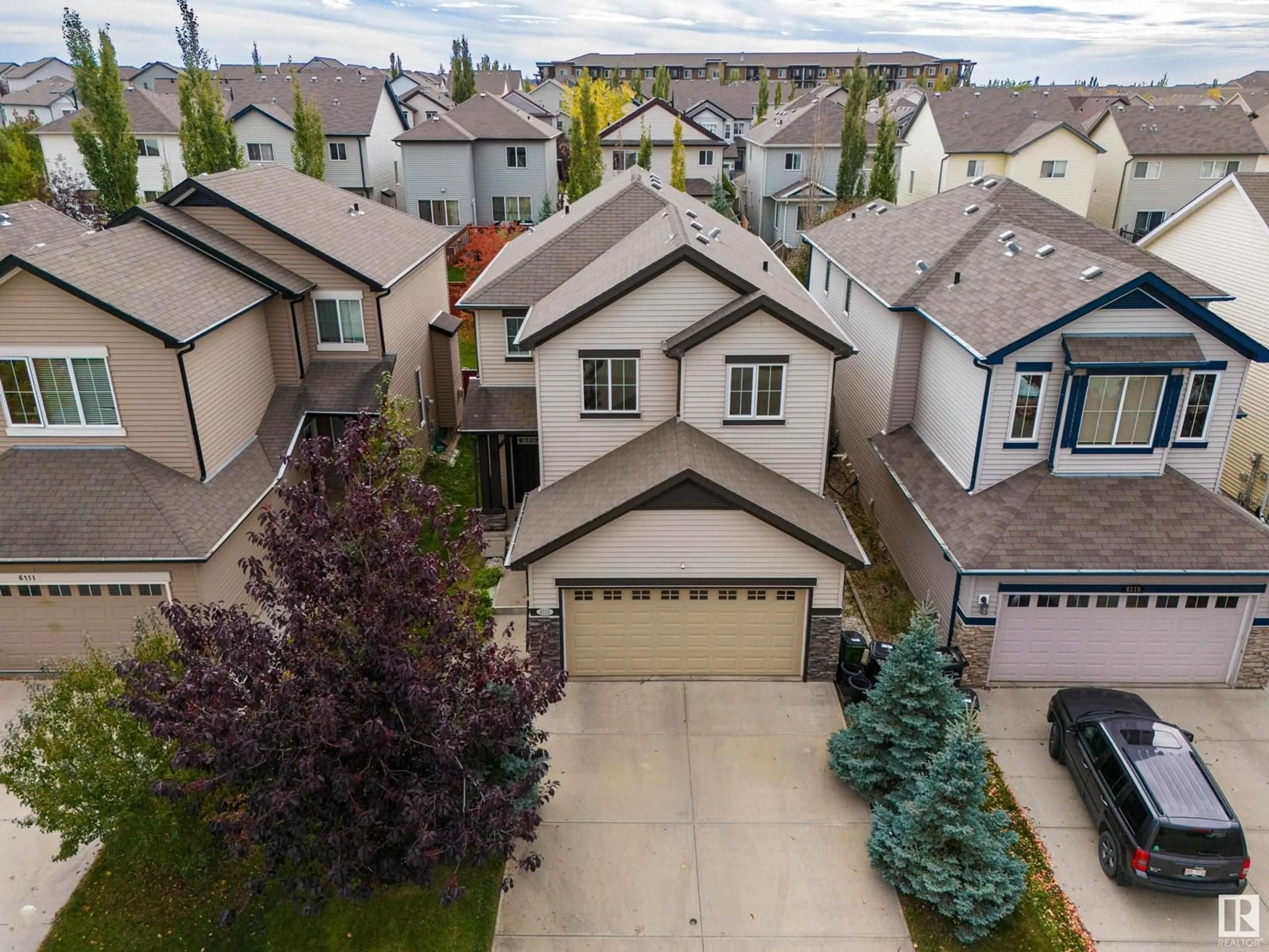 Frontside or backside of a home, the street view for 6115 11 AV SW, Edmonton Alberta T6X0M4