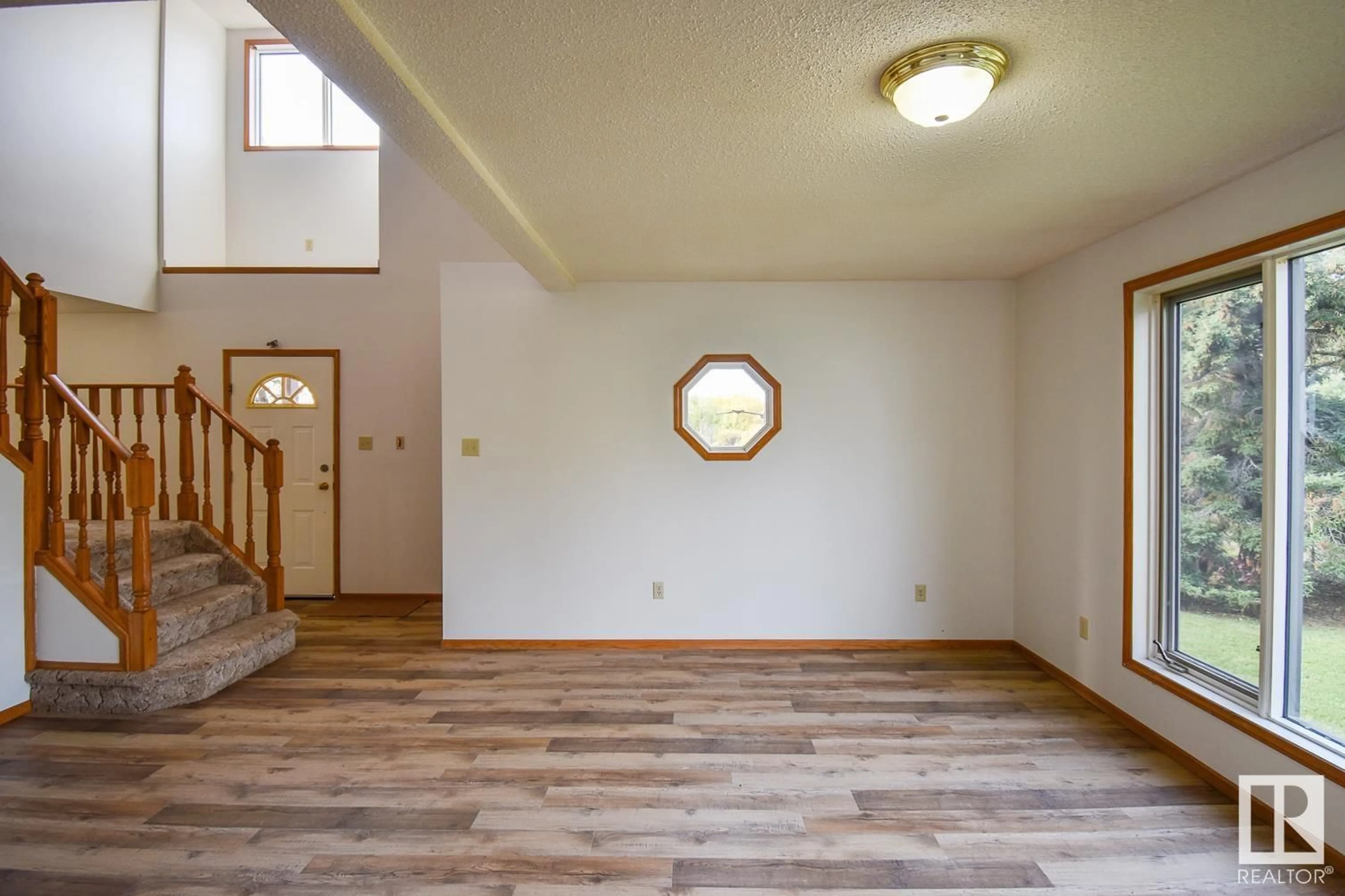 A pic of a room, wood floors for 5006 Trail of 1898, Rural Lac Ste. Anne County Alberta T0E0J0