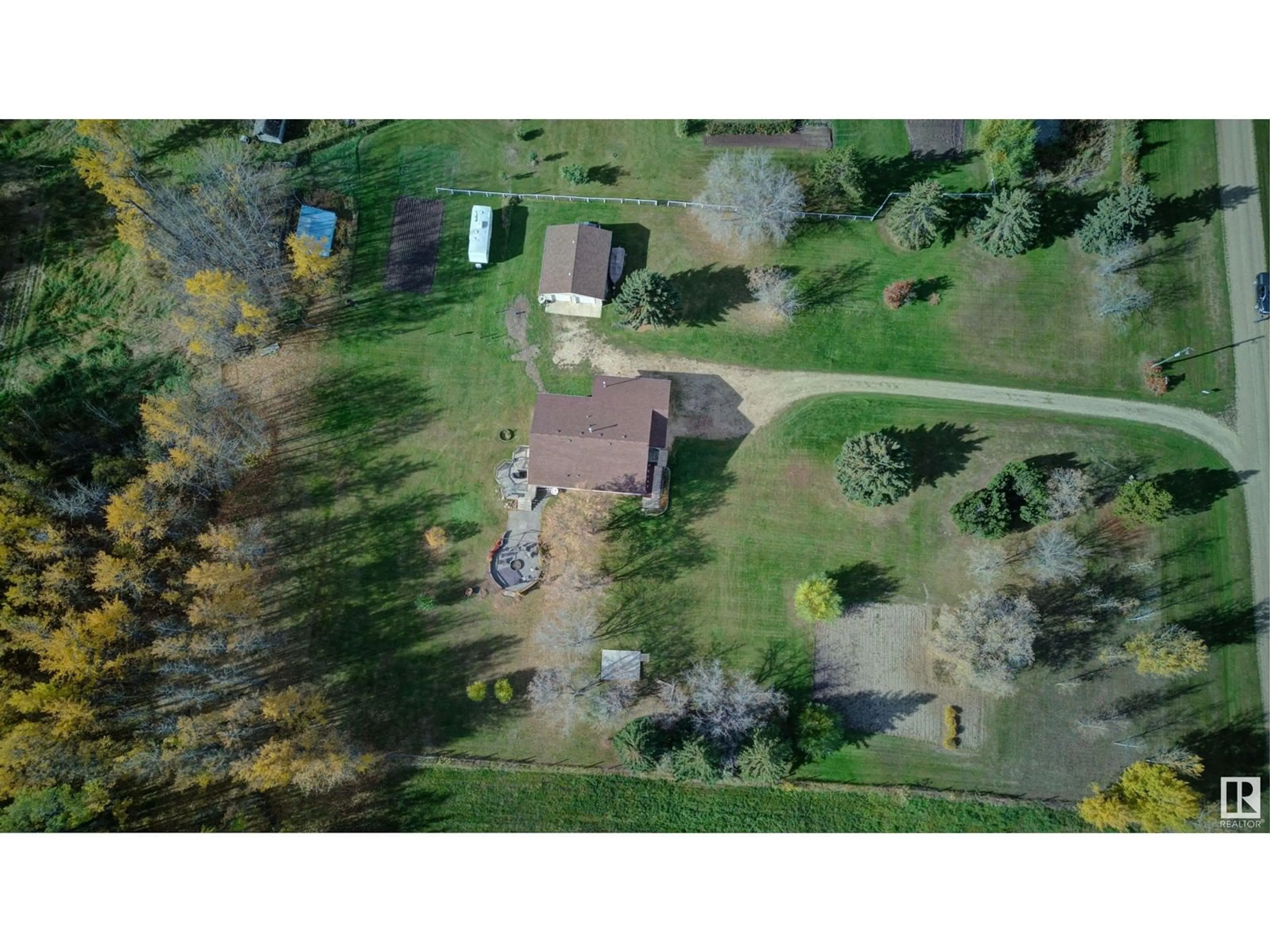 A pic from outside/outdoor area/front of a property/back of a property/a pic from drone, forest/trees view for 5113 TWP RD 592A, Rural Barrhead County Alberta T7N1N3