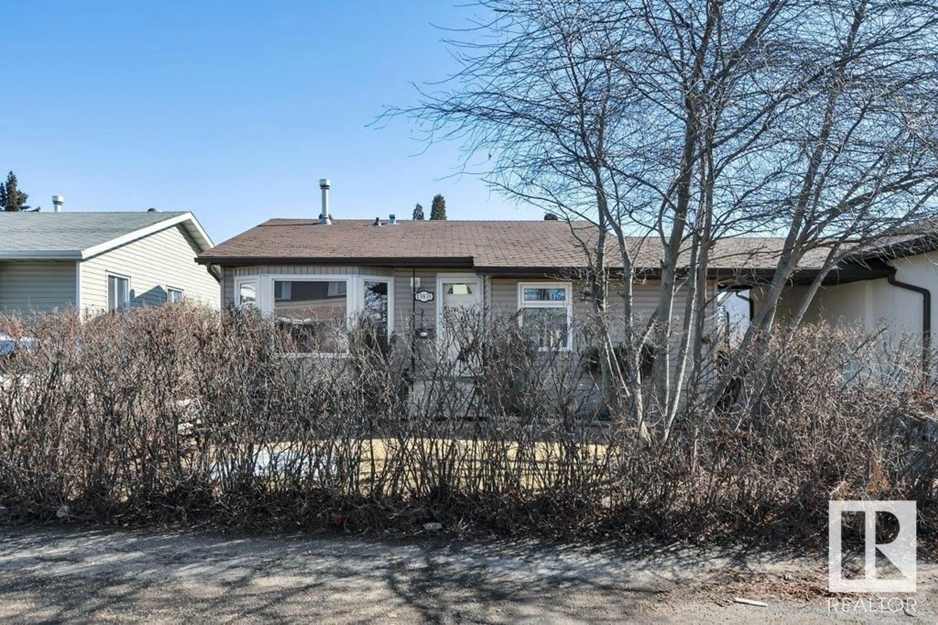 Frontside or backside of a home, cottage for 13835 114 ST NW, Edmonton Alberta T5X4A1