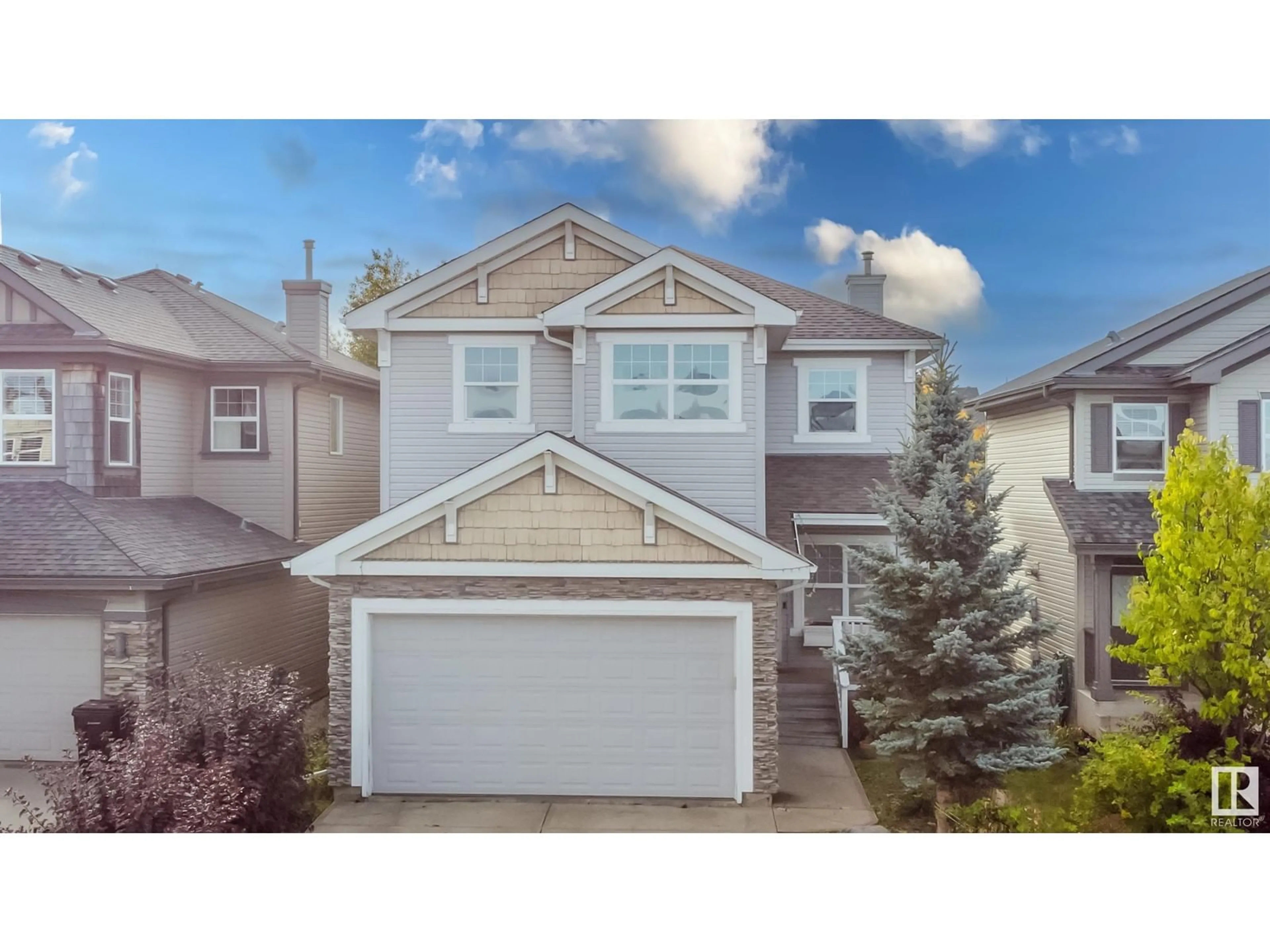 Frontside or backside of a home, the street view for 2168 HADDOW DR NW NW, Edmonton Alberta T6R3M6