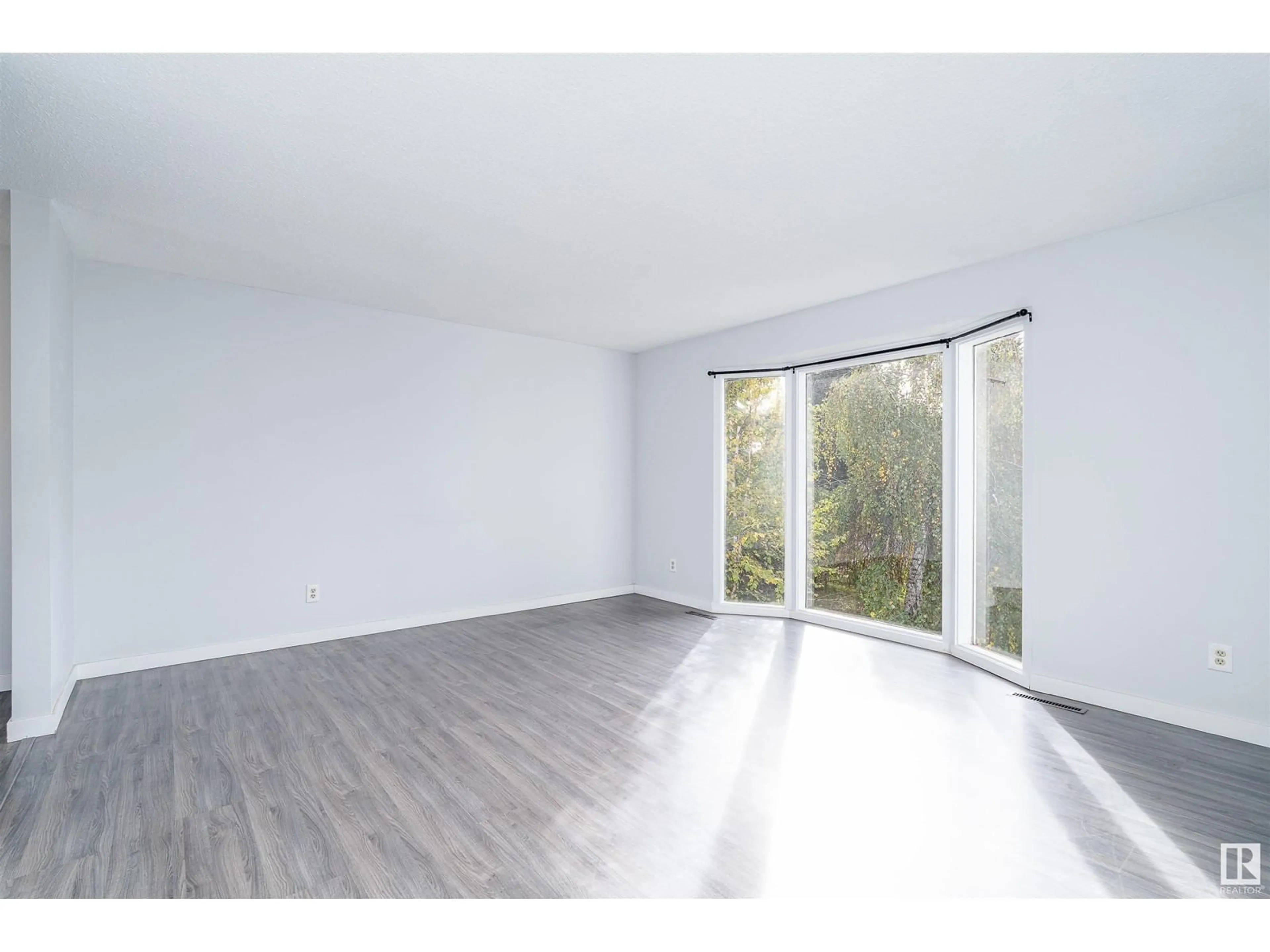 A pic of a room, wood floors for 11616 39A AV NW, Edmonton Alberta T6J0N8