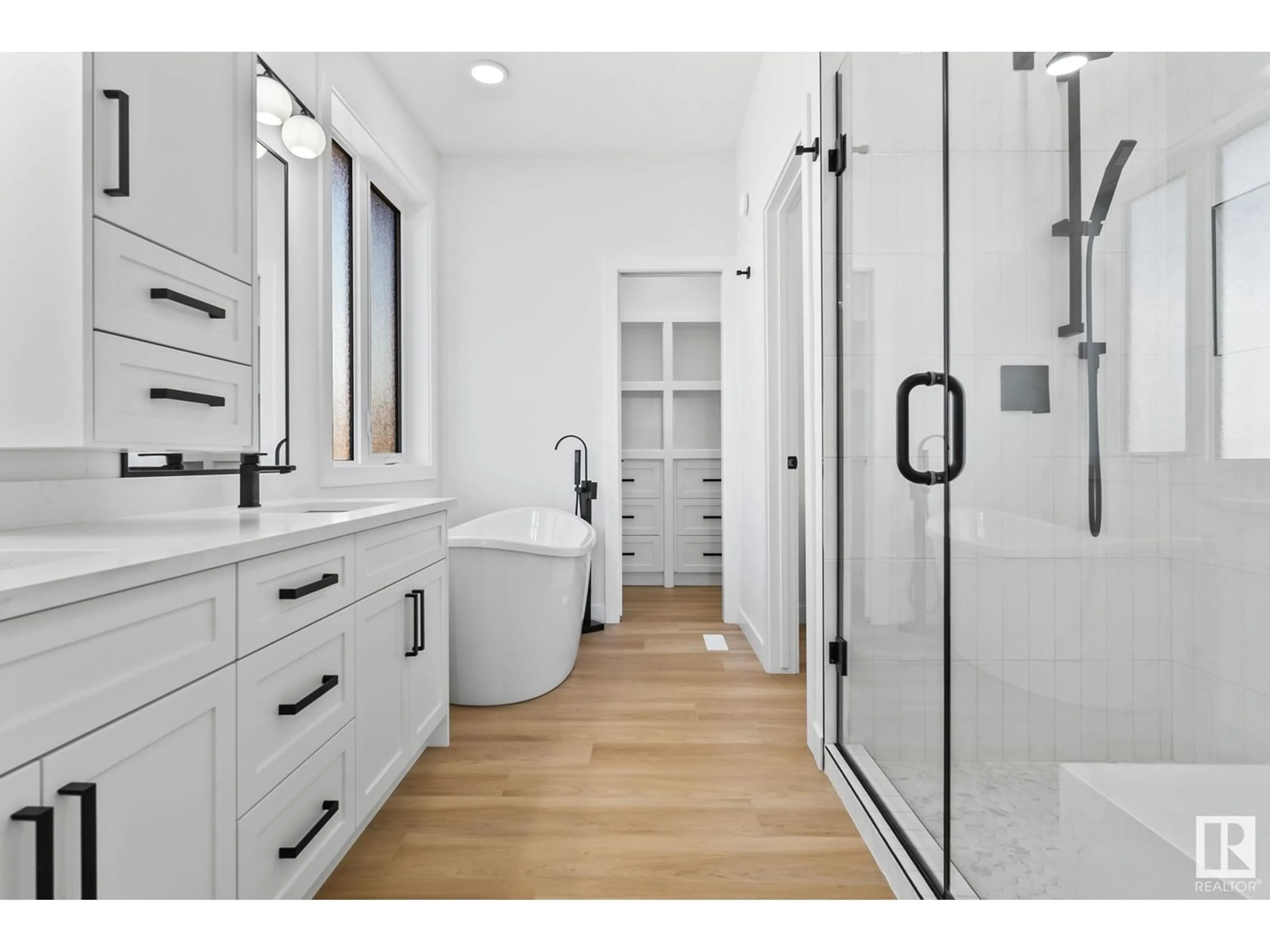 Contemporary bathroom, wood floors for 3327 Chickadee Dr NW, Edmonton Alberta T5S0V6