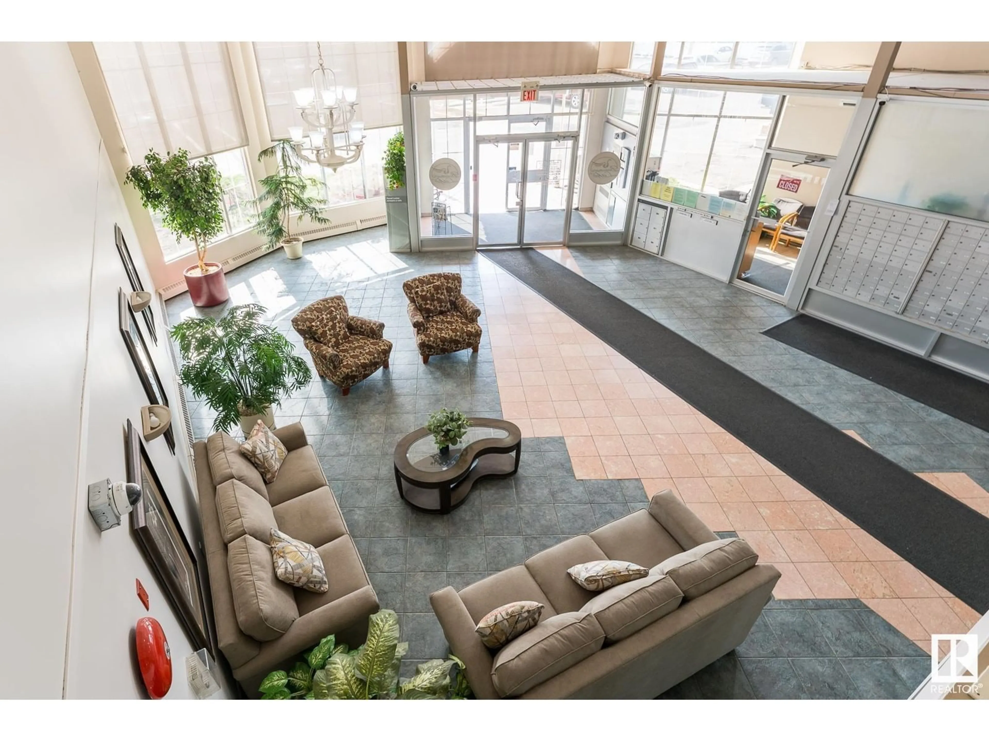 Indoor lobby, ceramic floors for #128 15499 CASTLE DOWNS RD NW, Edmonton Alberta T5K5Y3