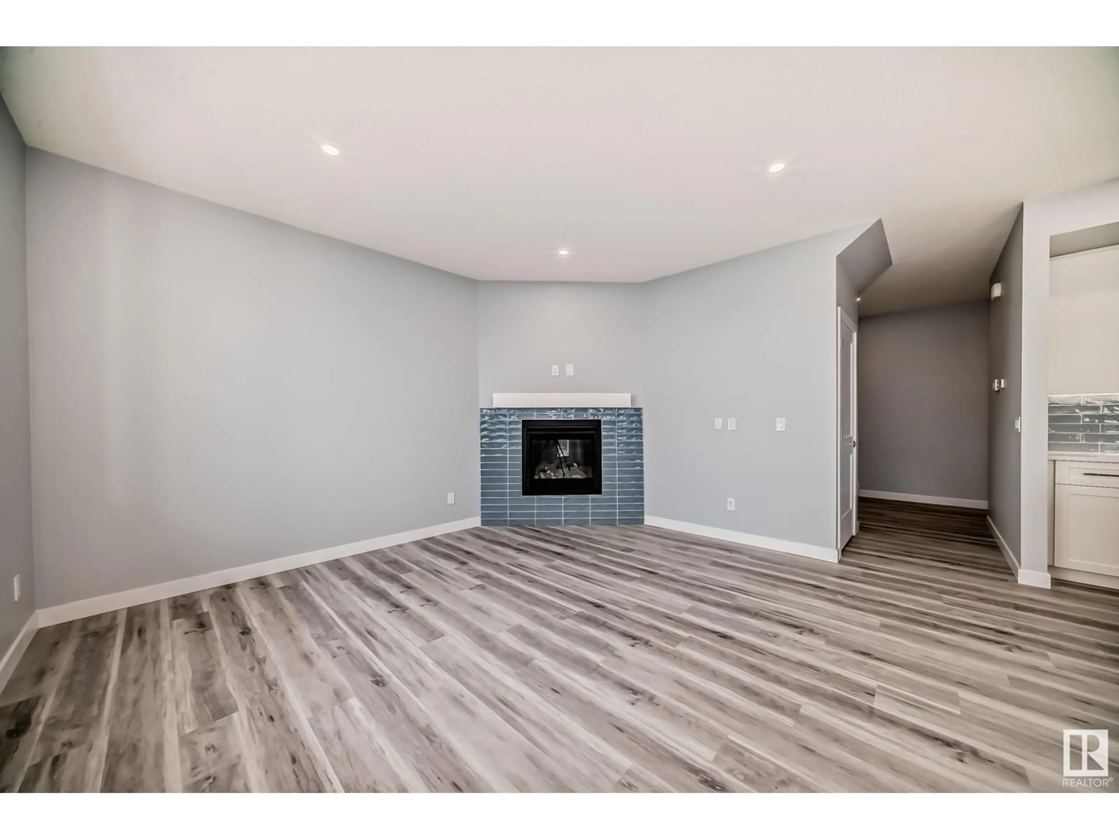 A pic of a room, wood floors for 10238 92A AV, Morinville Alberta T8R2R4