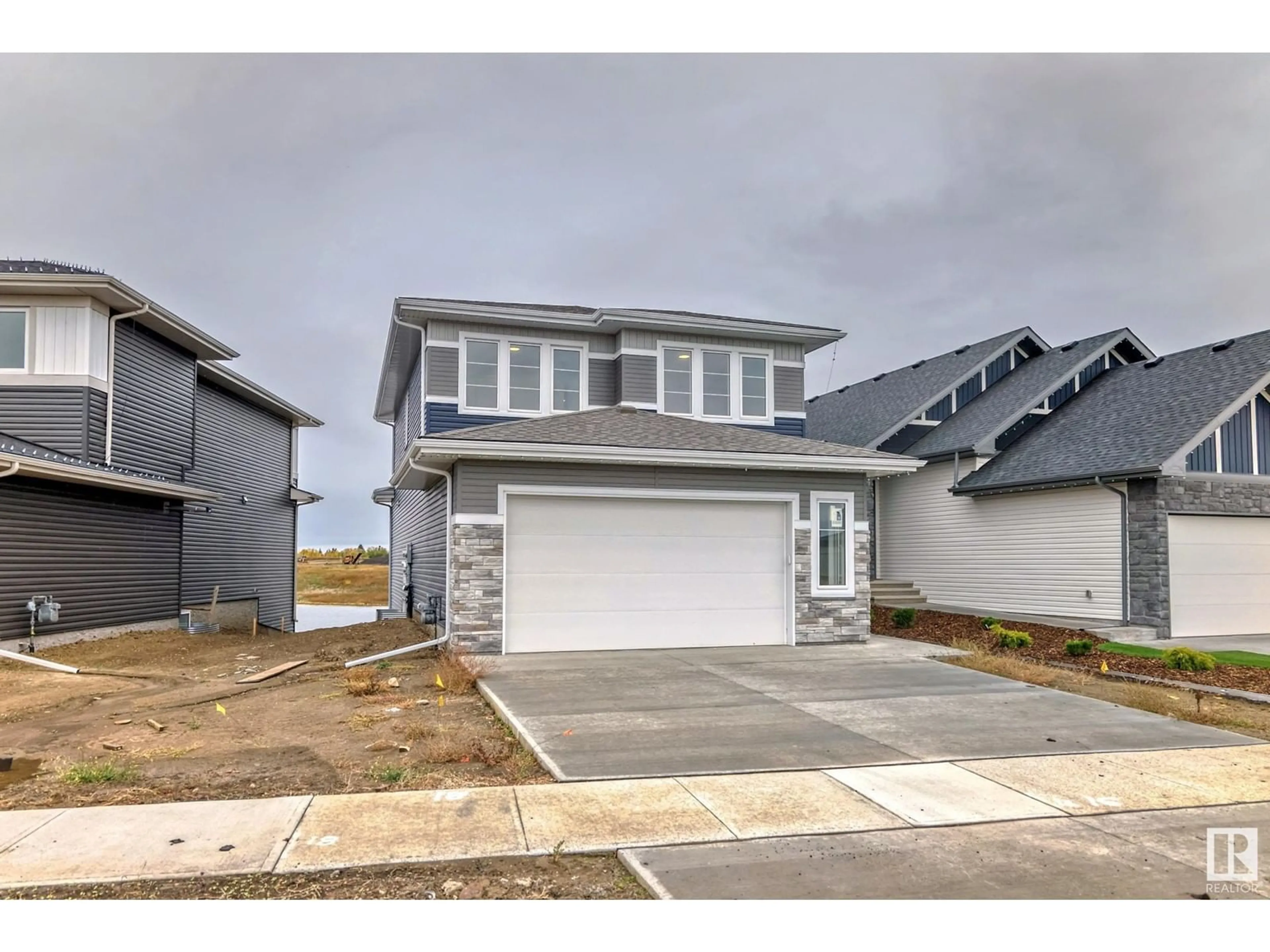 Frontside or backside of a home, the street view for 10226 92A AV, Morinville Alberta T8R2R4