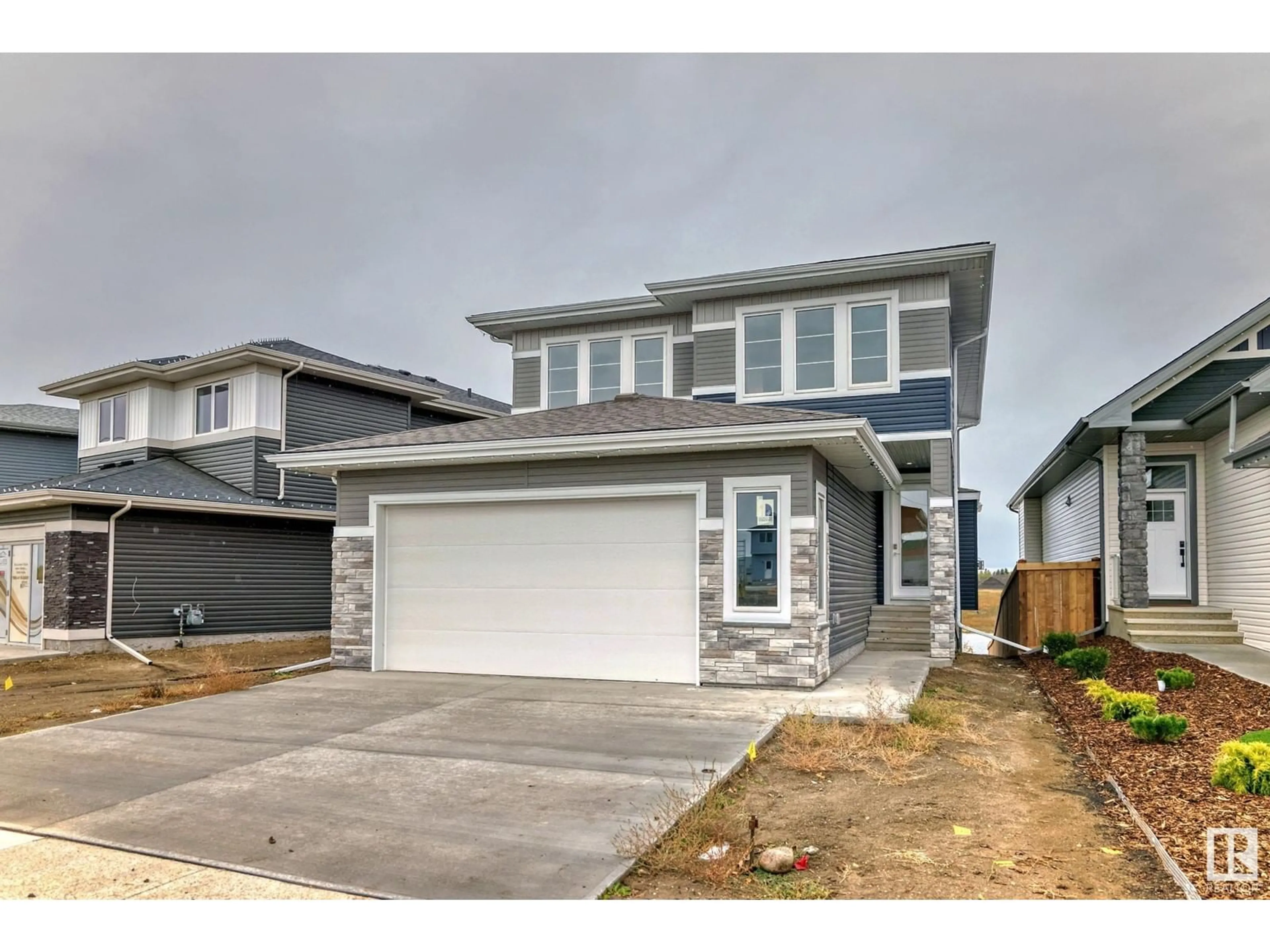 Frontside or backside of a home, the street view for 10226 92A AV, Morinville Alberta T8R2R4