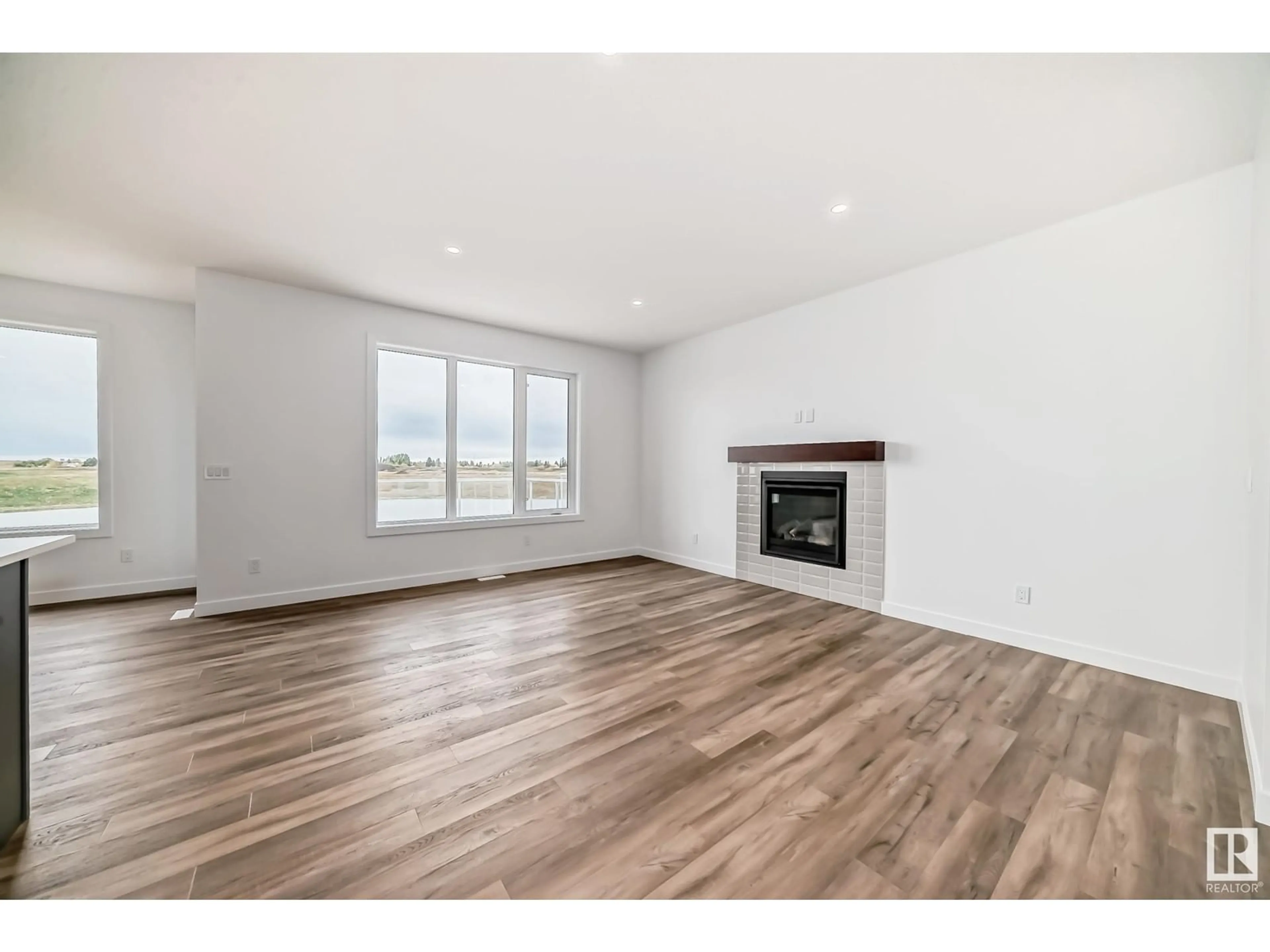 A pic of a room, wood floors for 10226 92A AV, Morinville Alberta T8R2R4