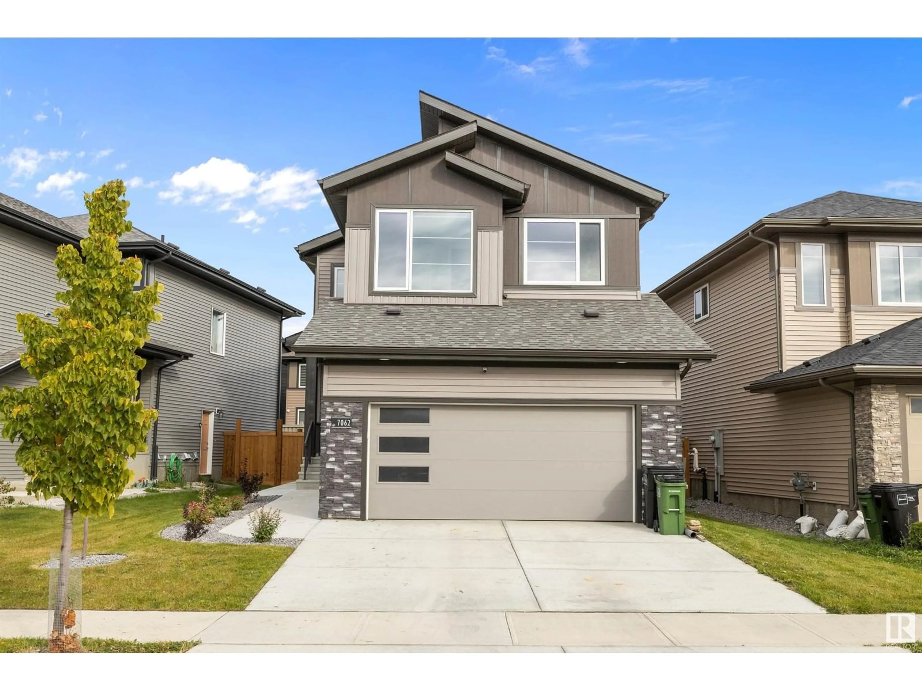 Frontside or backside of a home, the street view for 7062 Chivers Loop SW, Edmonton Alberta T6W1A6