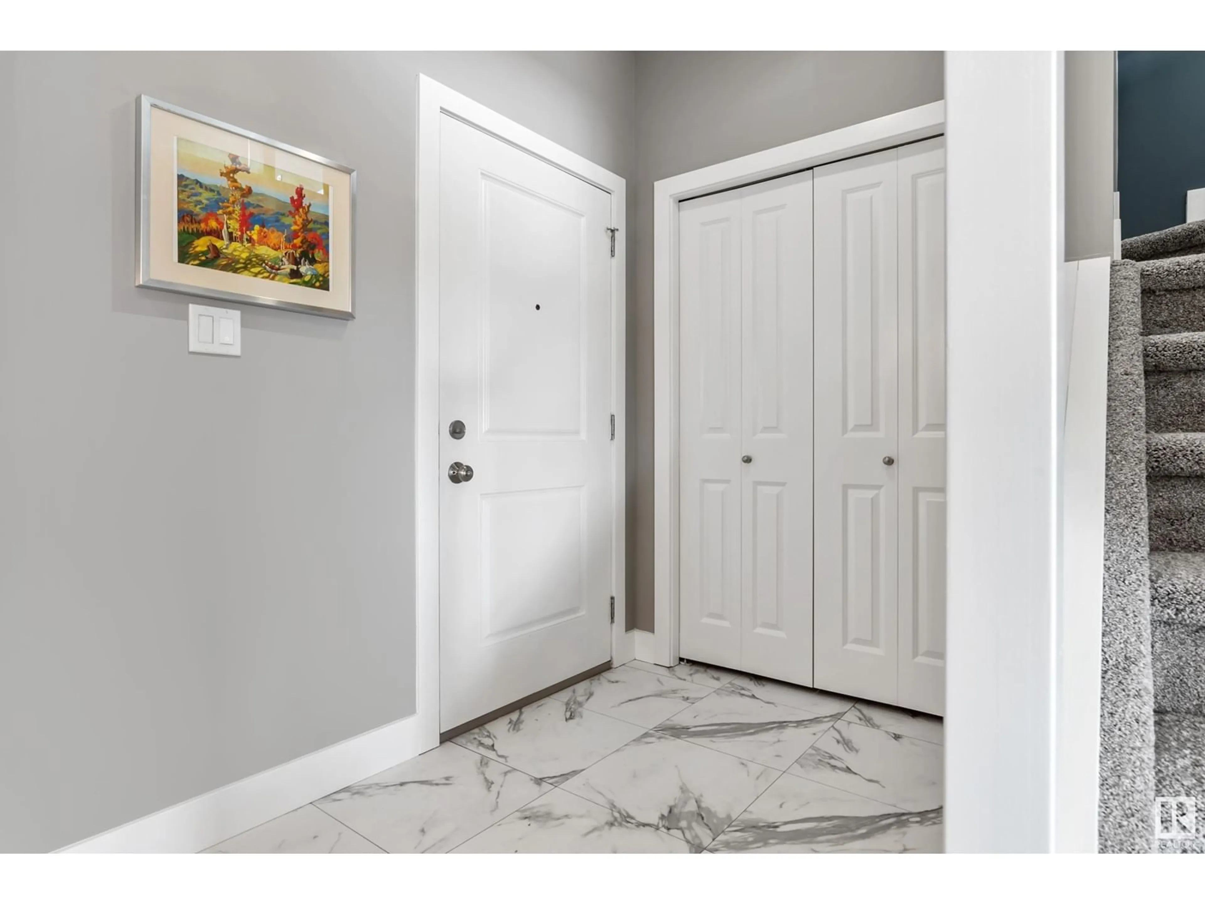 Indoor entryway, ceramic floors for 5308 22 AV SW, Edmonton Alberta T6X2H8