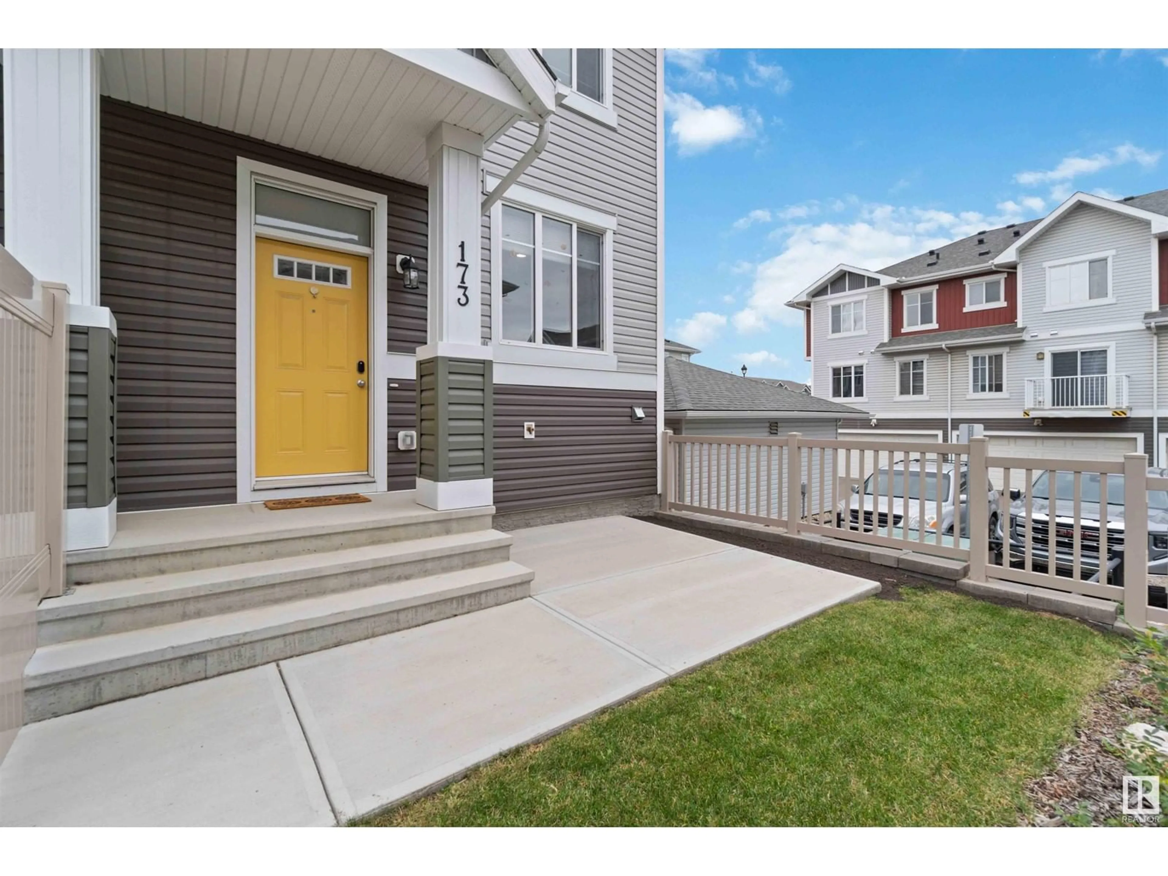 A pic from exterior of the house or condo, the fenced backyard for #173 2905 141 ST SW, Edmonton Alberta T6W3M4