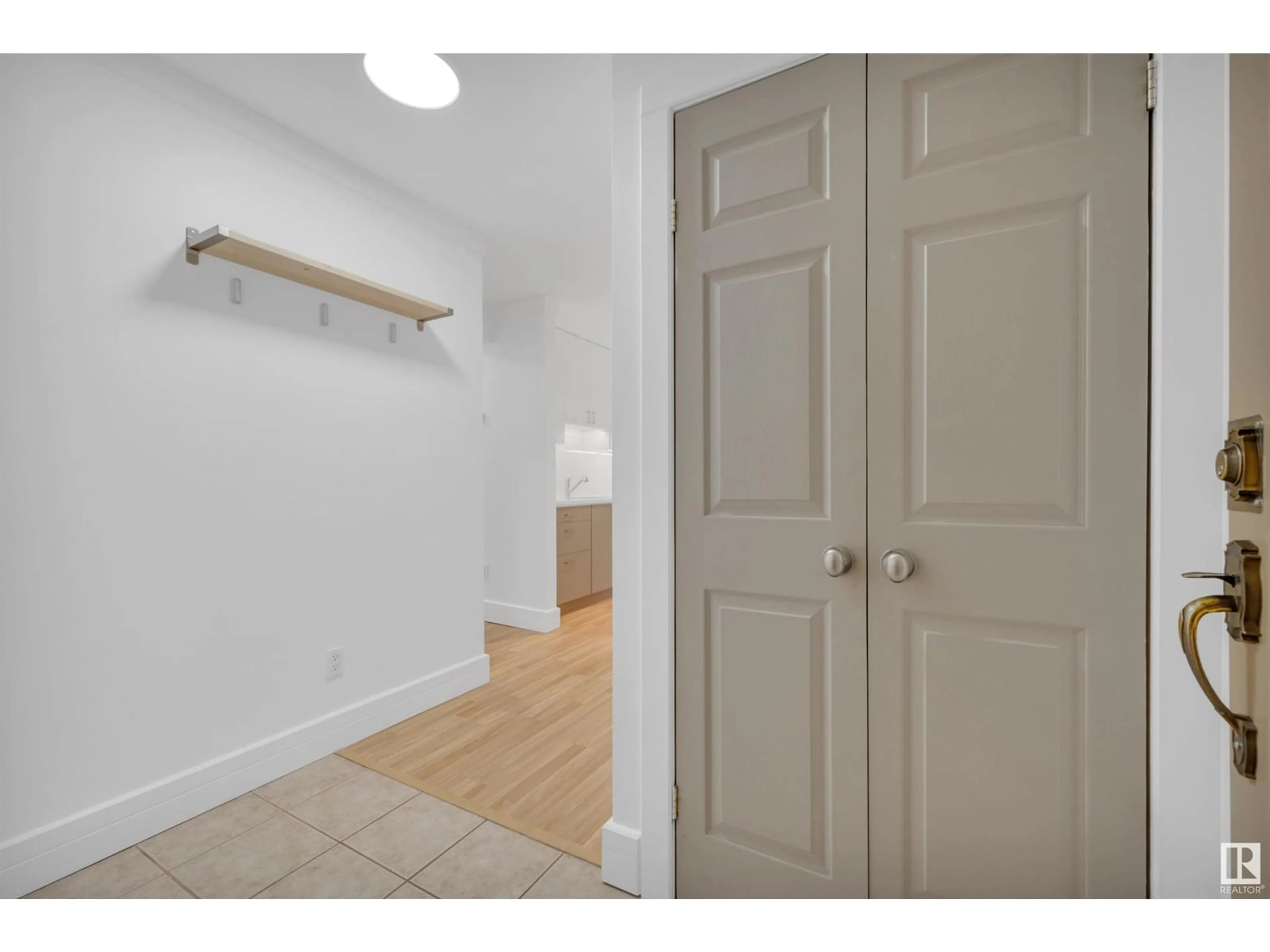 Indoor entryway, wood floors for #102 10611 84 AV NW, Edmonton Alberta T6E2H7