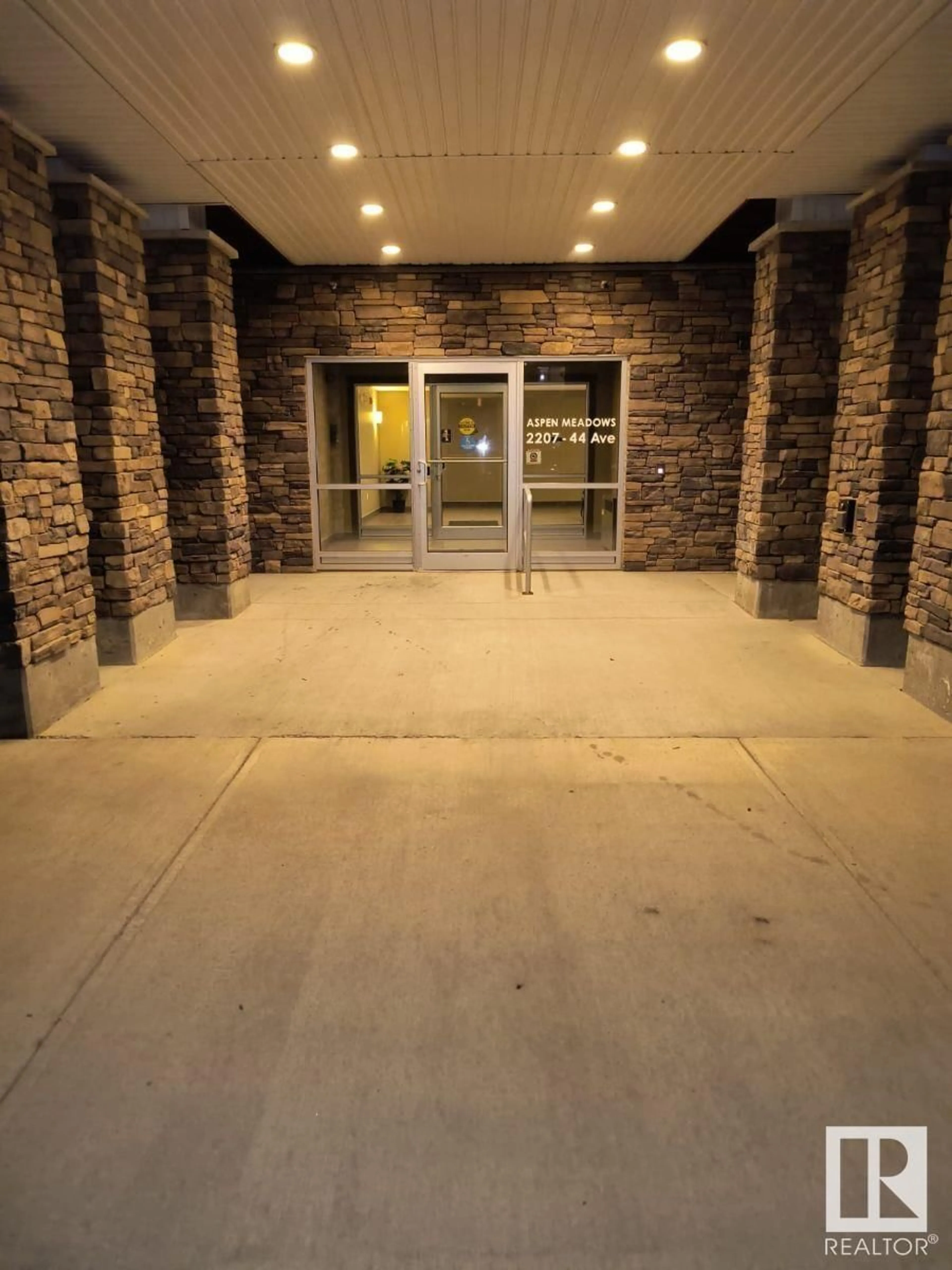 Indoor lobby, cement floor for #109 2207 44 AV NW, Edmonton Alberta T6T0T2