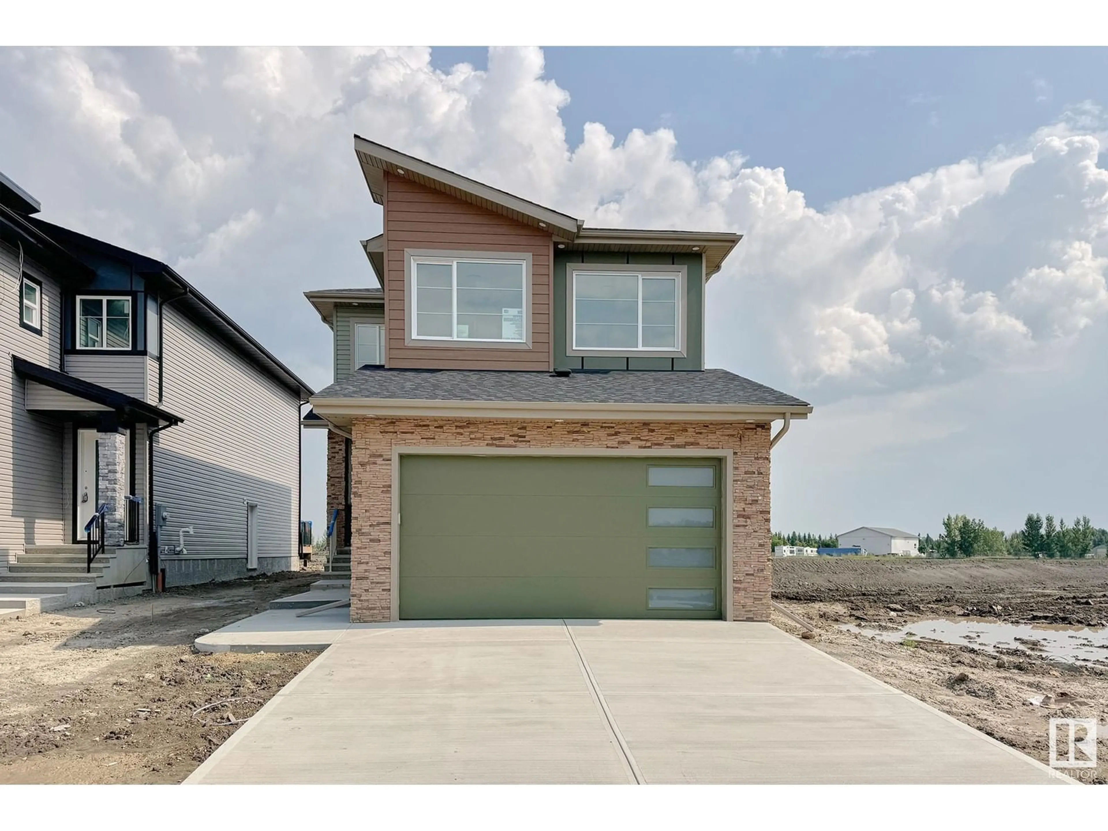 Frontside or backside of a home, the street view for 6327 17 ST NE, Rural Leduc County Alberta T4X0P5