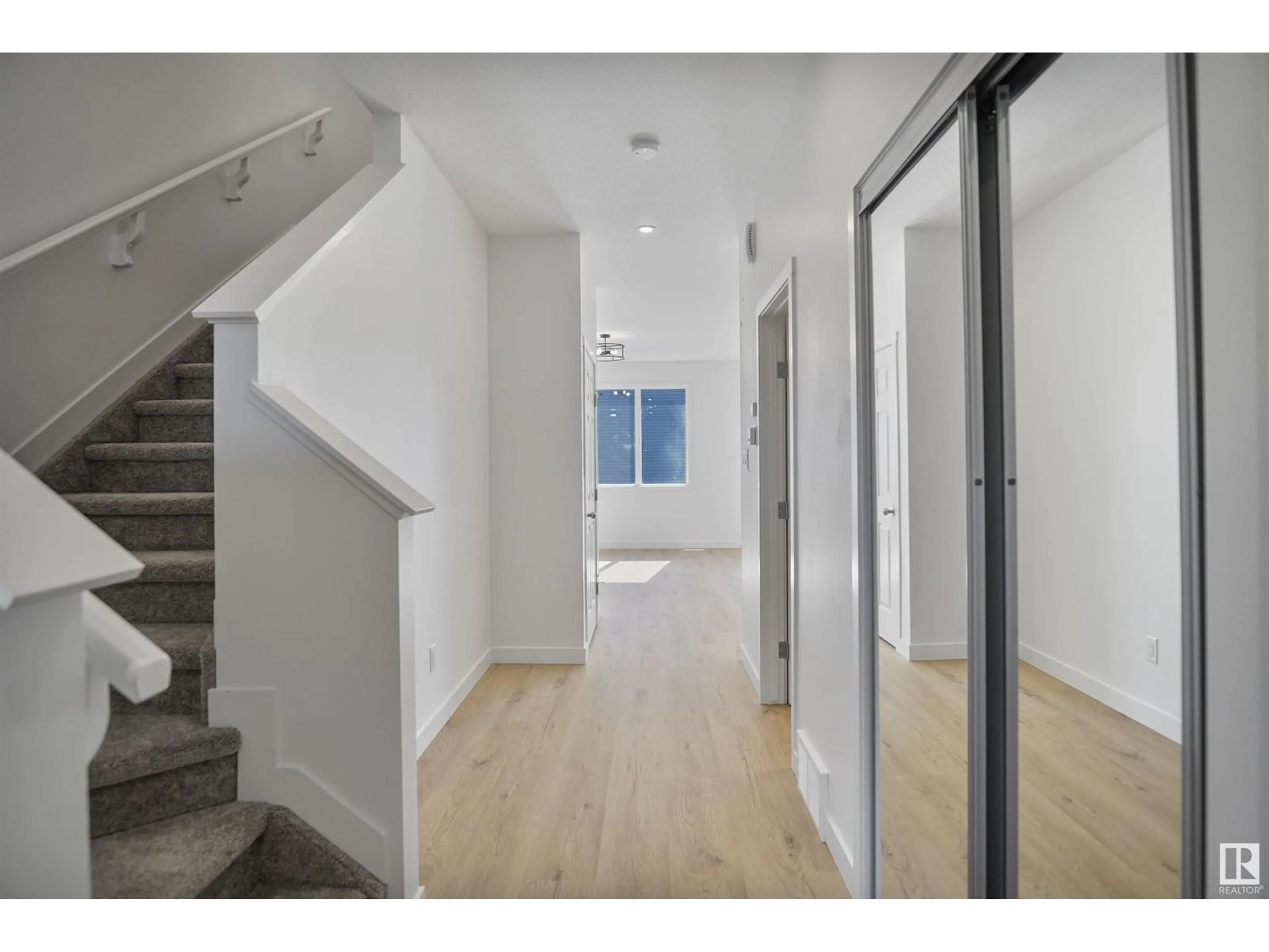 Indoor entryway, wood floors for 4932 KINNEY RD SW, Edmonton Alberta T6W5G9