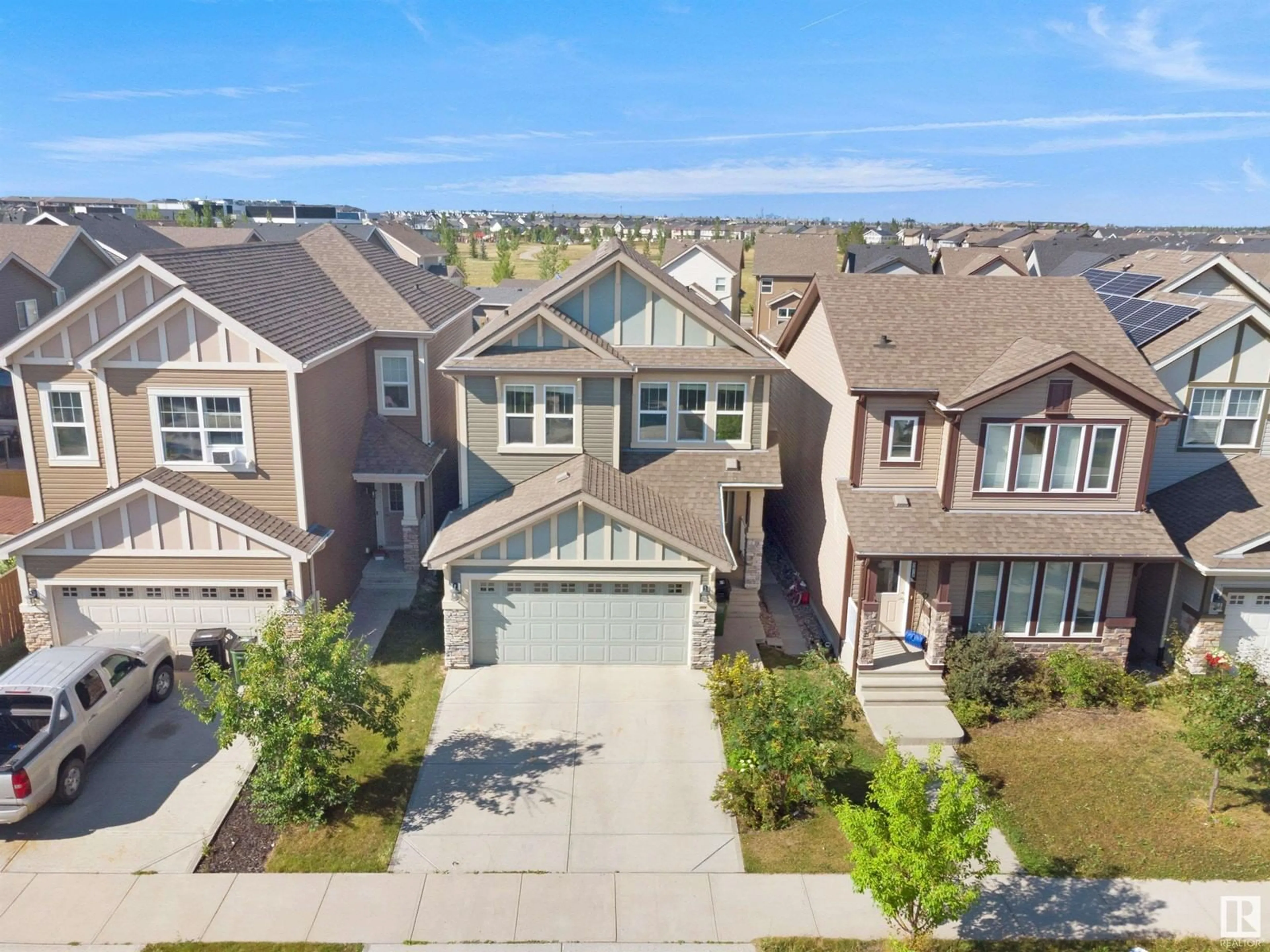 Frontside or backside of a home, the street view for 5874 ANTHONY CR SW, Edmonton Alberta T6W3H4