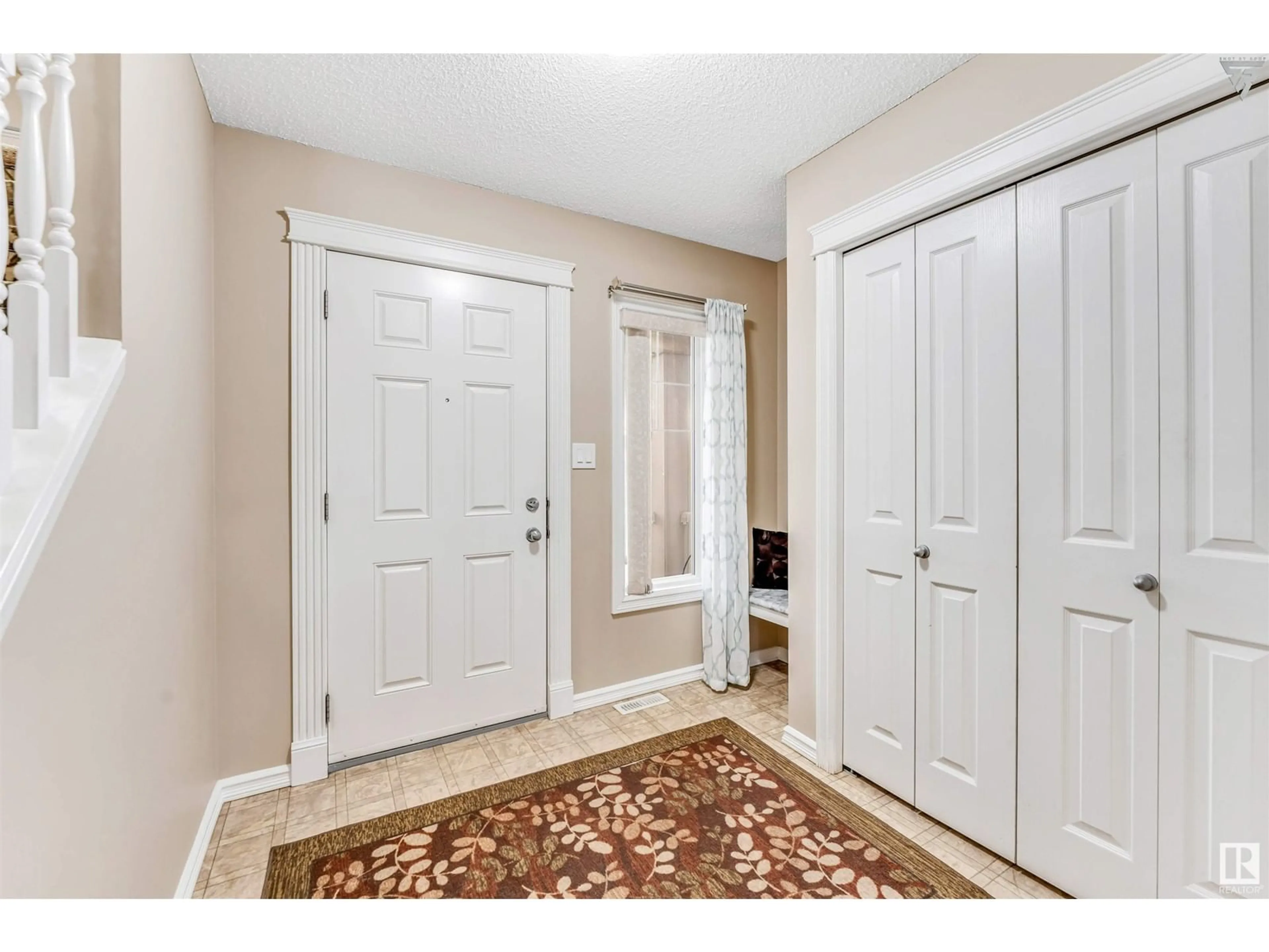 Indoor entryway, wood floors for 2012 33A AV NW, Edmonton Alberta T6T0C5