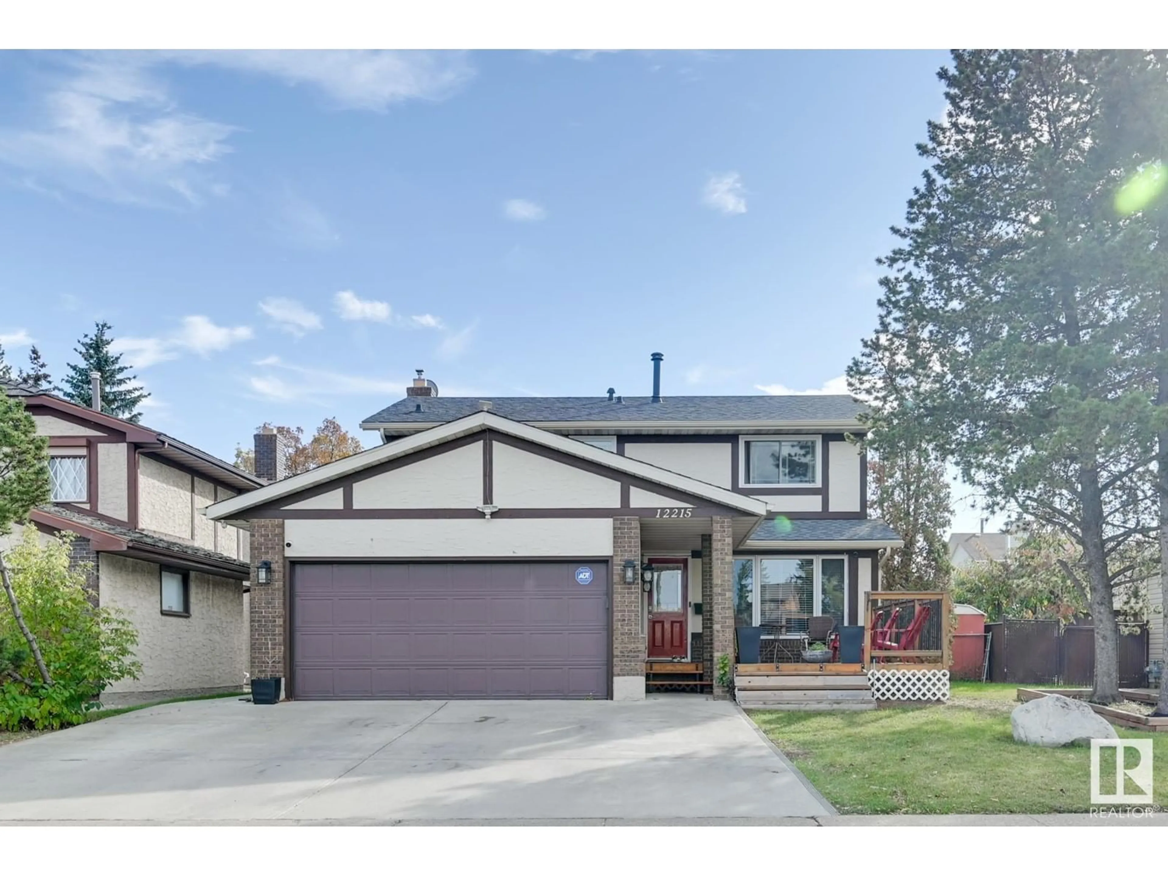 Frontside or backside of a home, the street view for 12215 143 AV NW, Edmonton Alberta T5X3L9