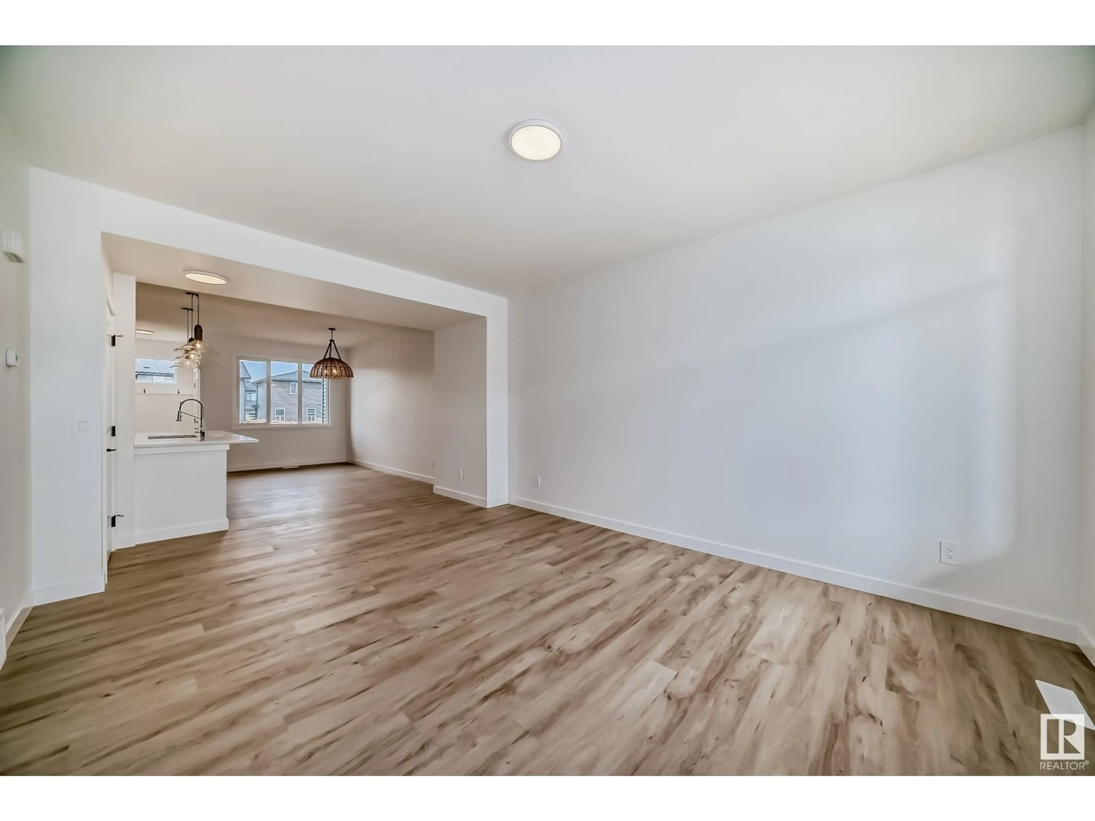 A pic of a room, wood floors for 3344 168 ST SW, Edmonton Alberta T6W5M2