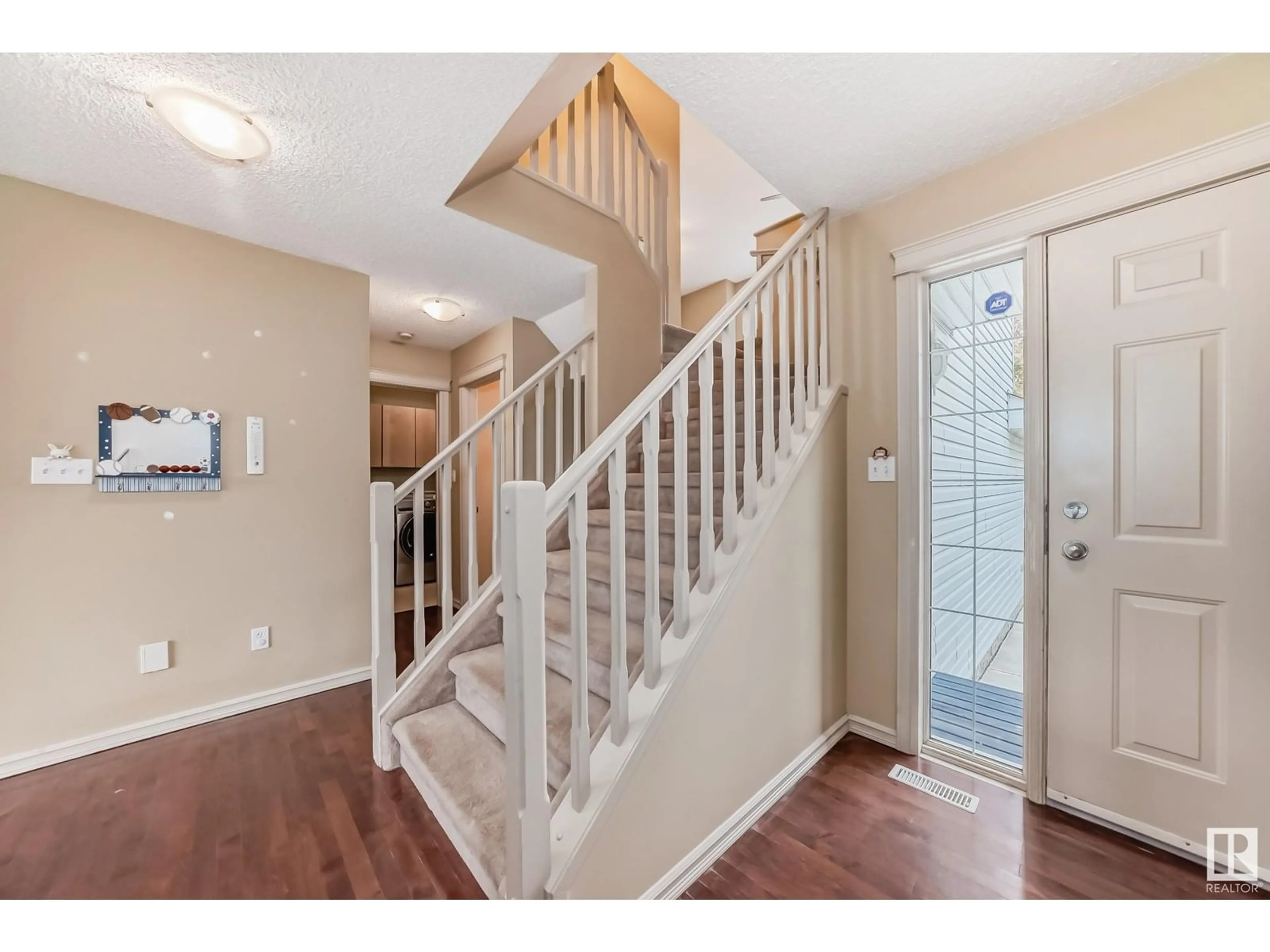 Indoor entryway, wood floors for 842 BARNES LINK LI SW, Edmonton Alberta T6W1G7