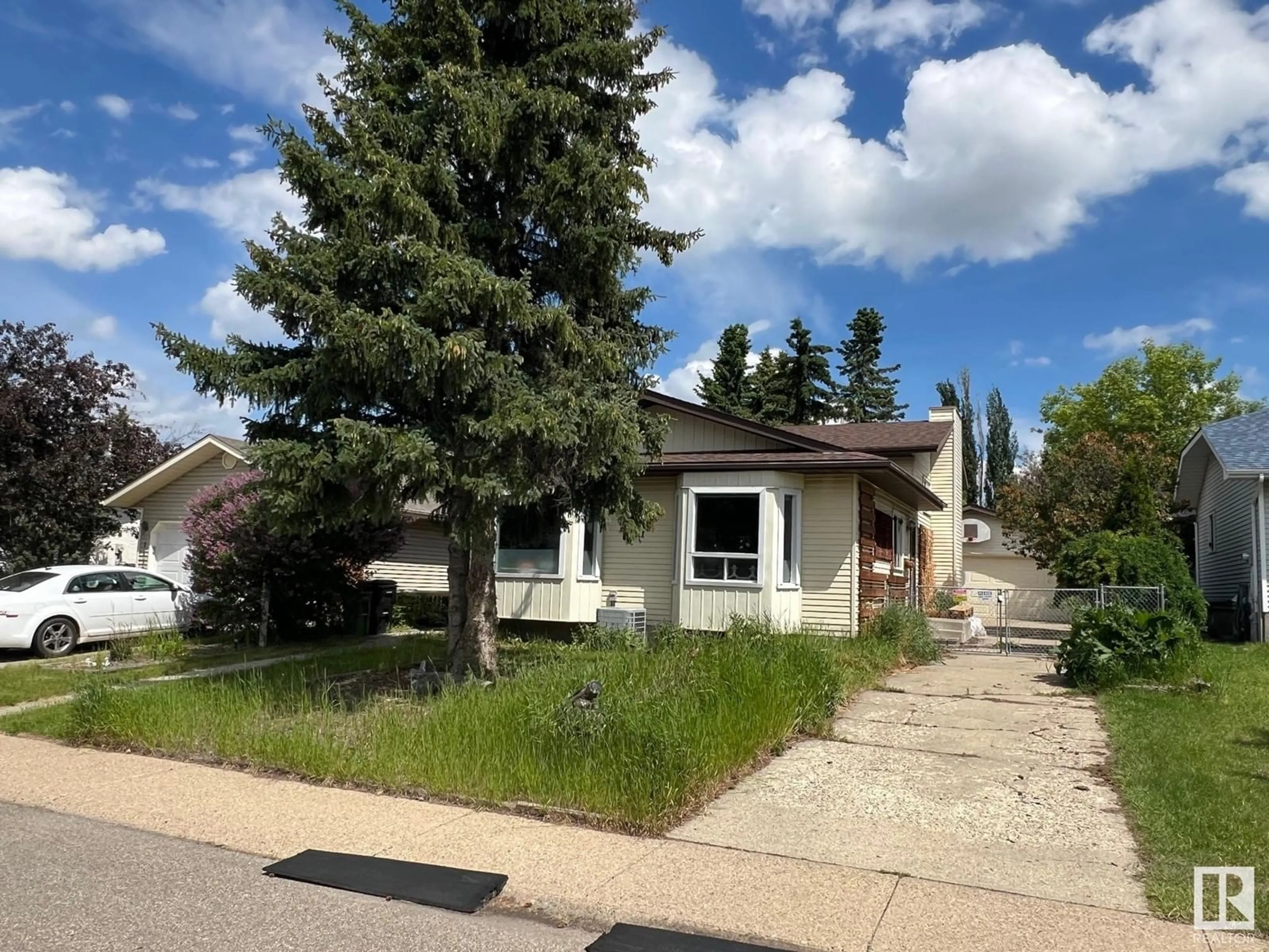 Frontside or backside of a home, the street view for 1111 49A ST NW, Edmonton Alberta T6L4C5