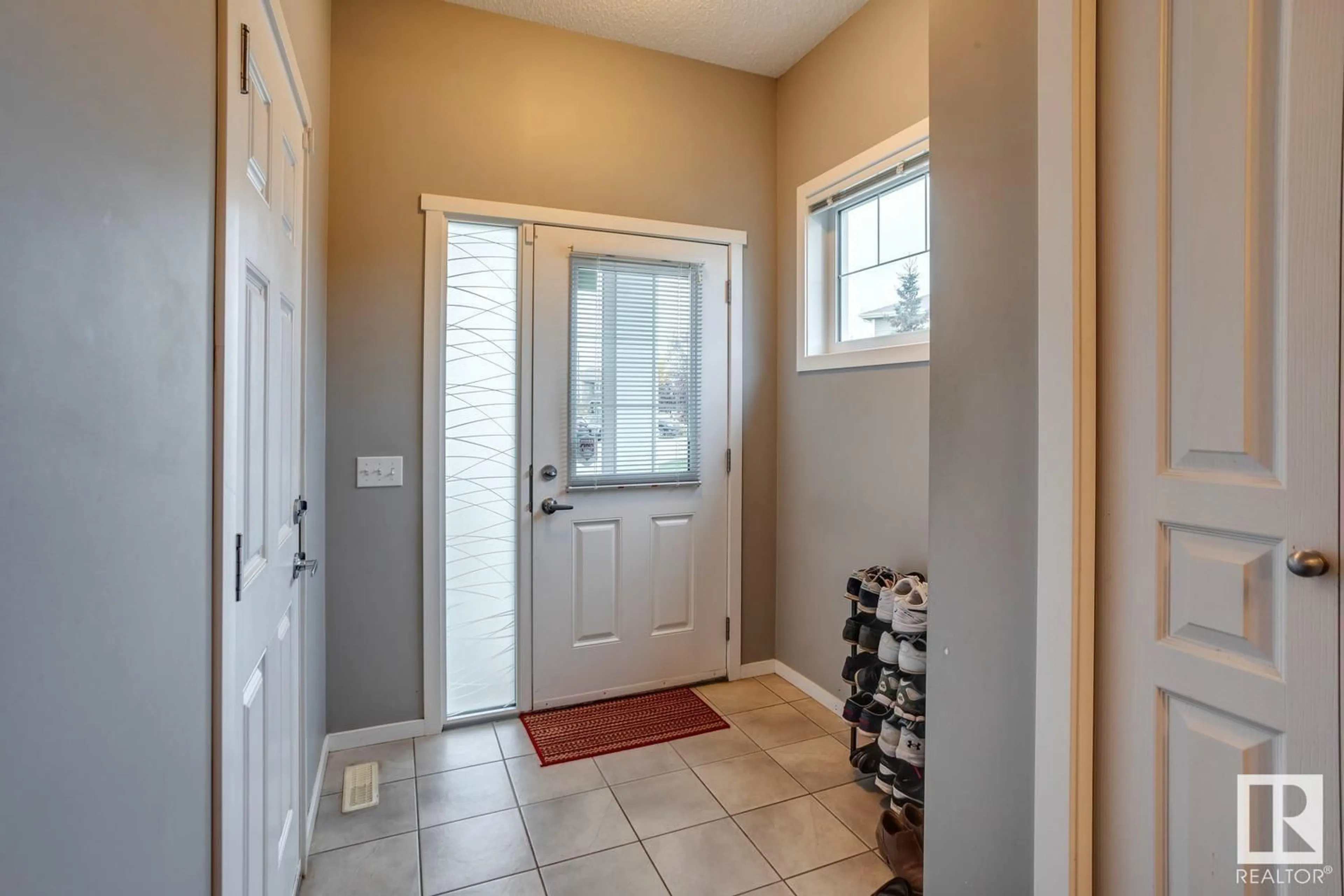 Indoor entryway, wood floors for #28 8209 217 ST NW NW, Edmonton Alberta T5T6Z4