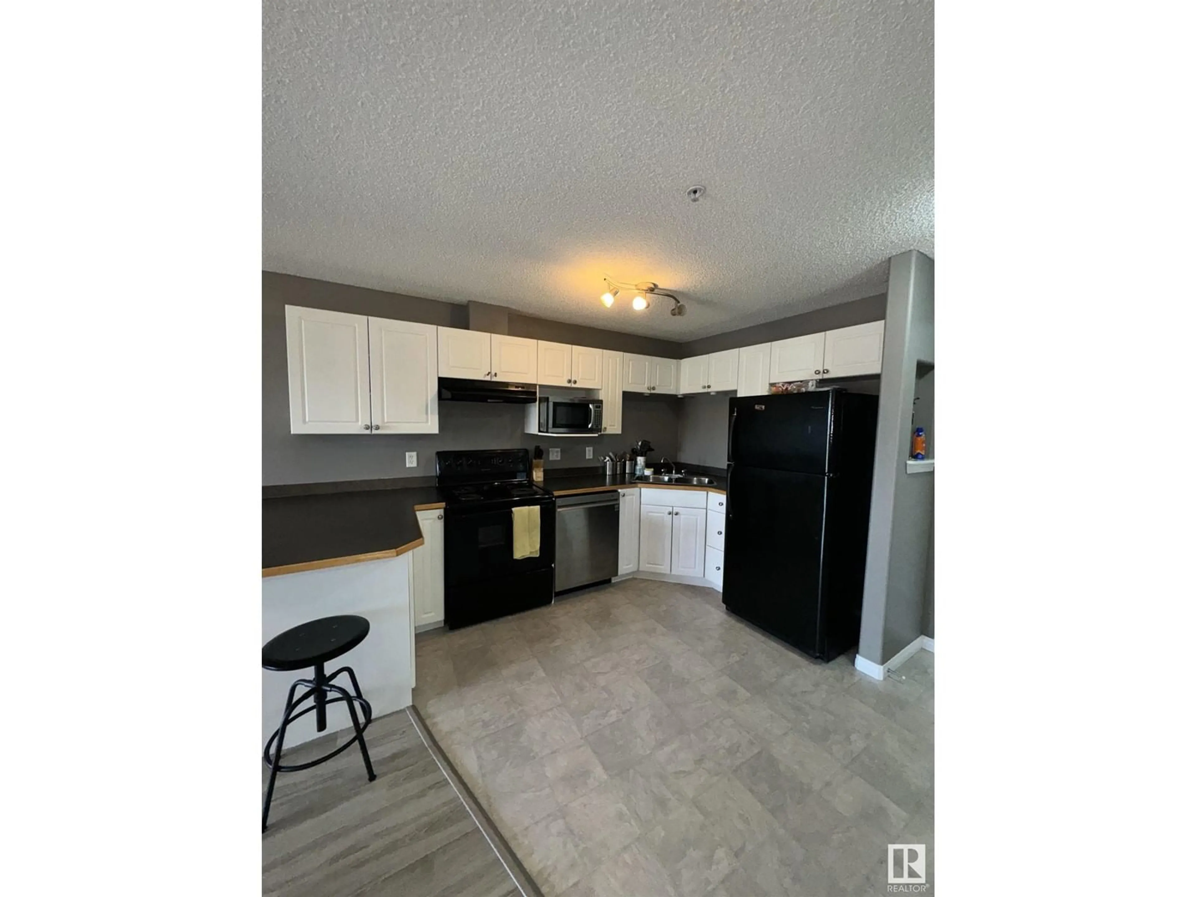 Open concept kitchen for #234 9525 162 ave NW, Edmonton Alberta T5Z3V2