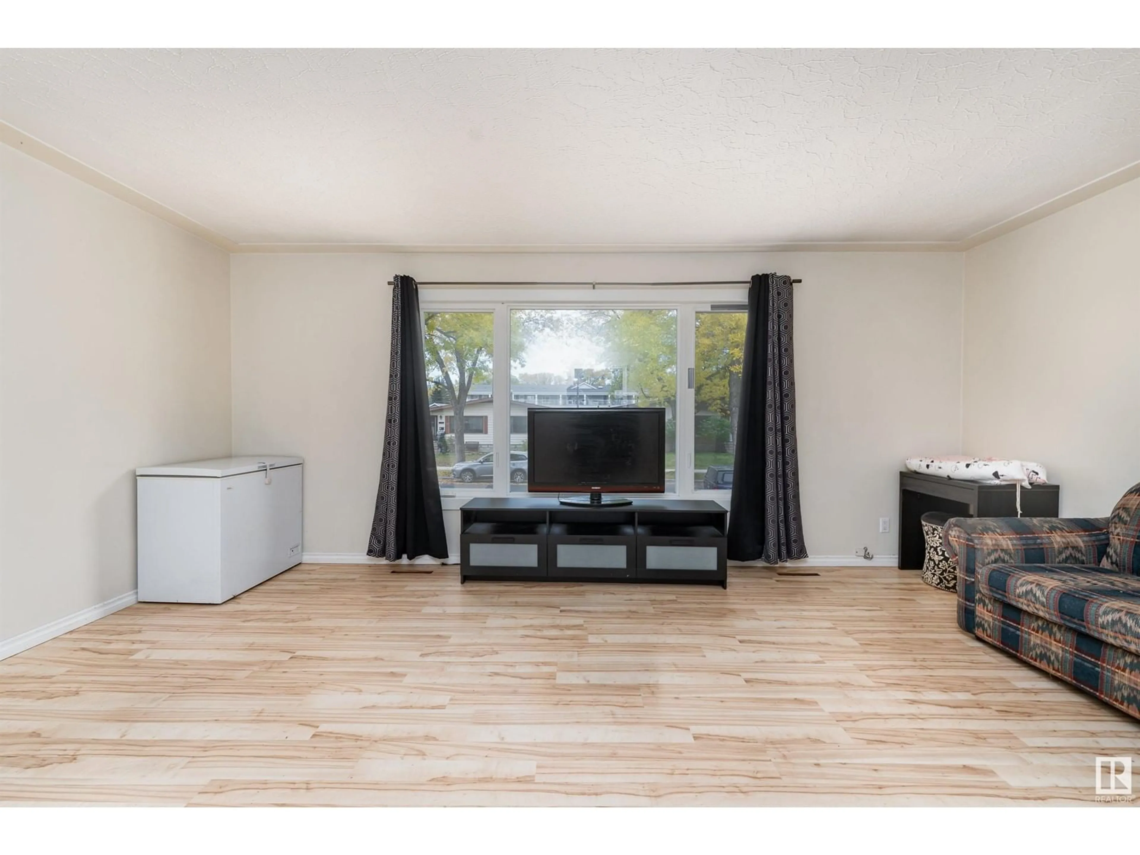 Living room, wood floors for 12907 102 ST NW, Edmonton Alberta T5E4J4