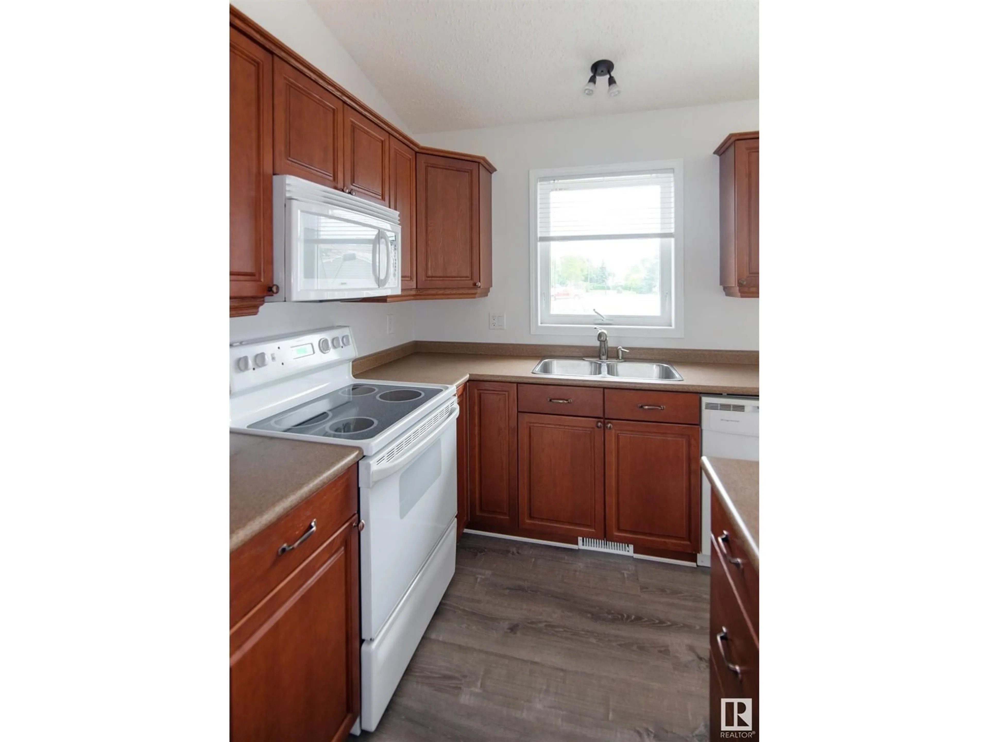 Standard kitchen, wood floors, cottage for 5208 51 AV, Bonnyville Town Alberta T9N2G9