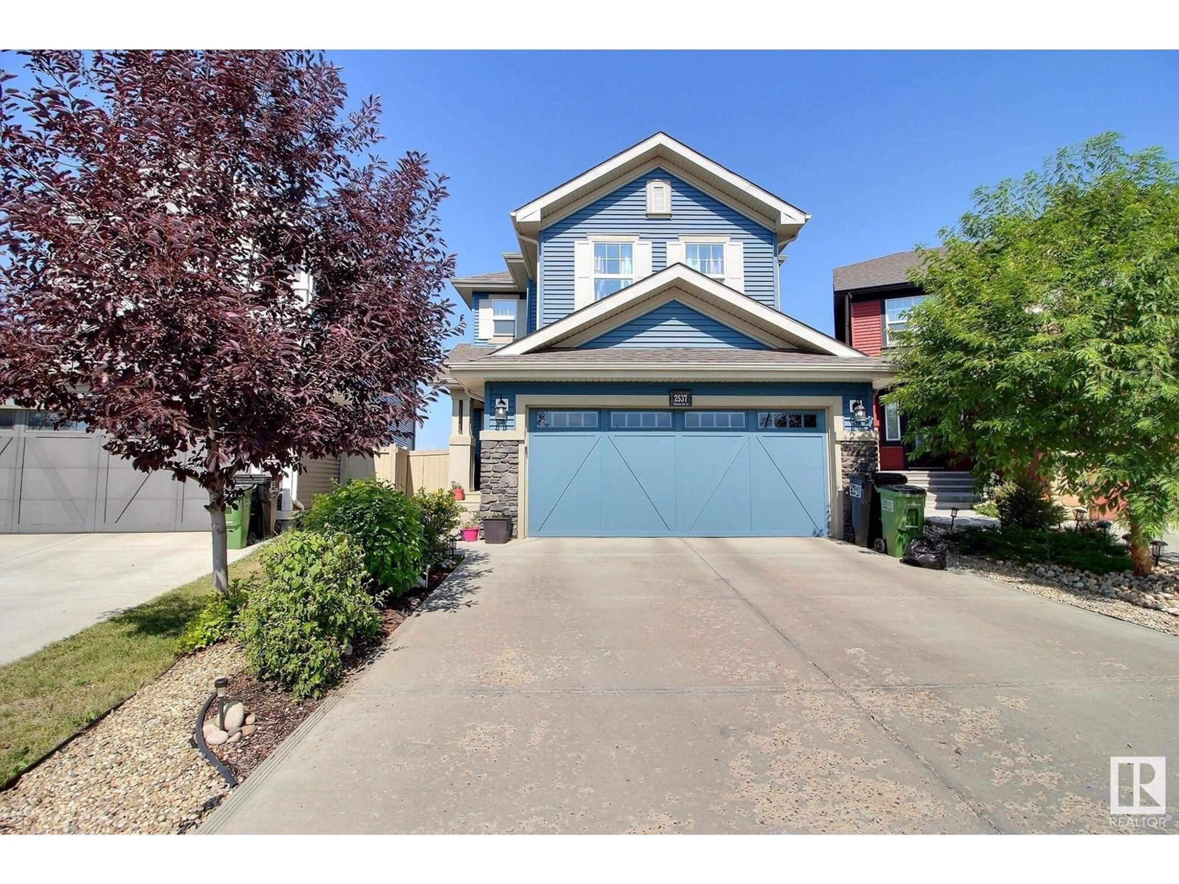 Frontside or backside of a home, the street view for 2537 ORCHARDS WY SW, Edmonton Alberta T6X2E1