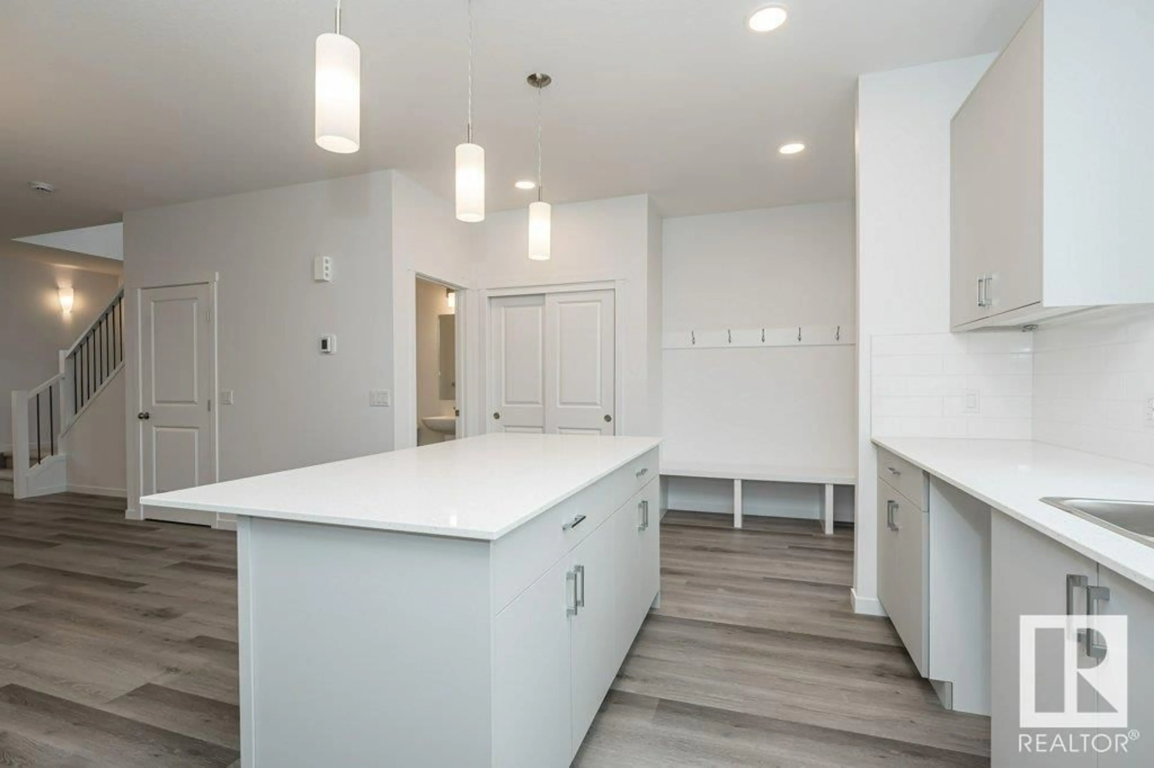 Open concept kitchen for 2431 TRUMPETER WY NW, Edmonton Alberta T5S0S9