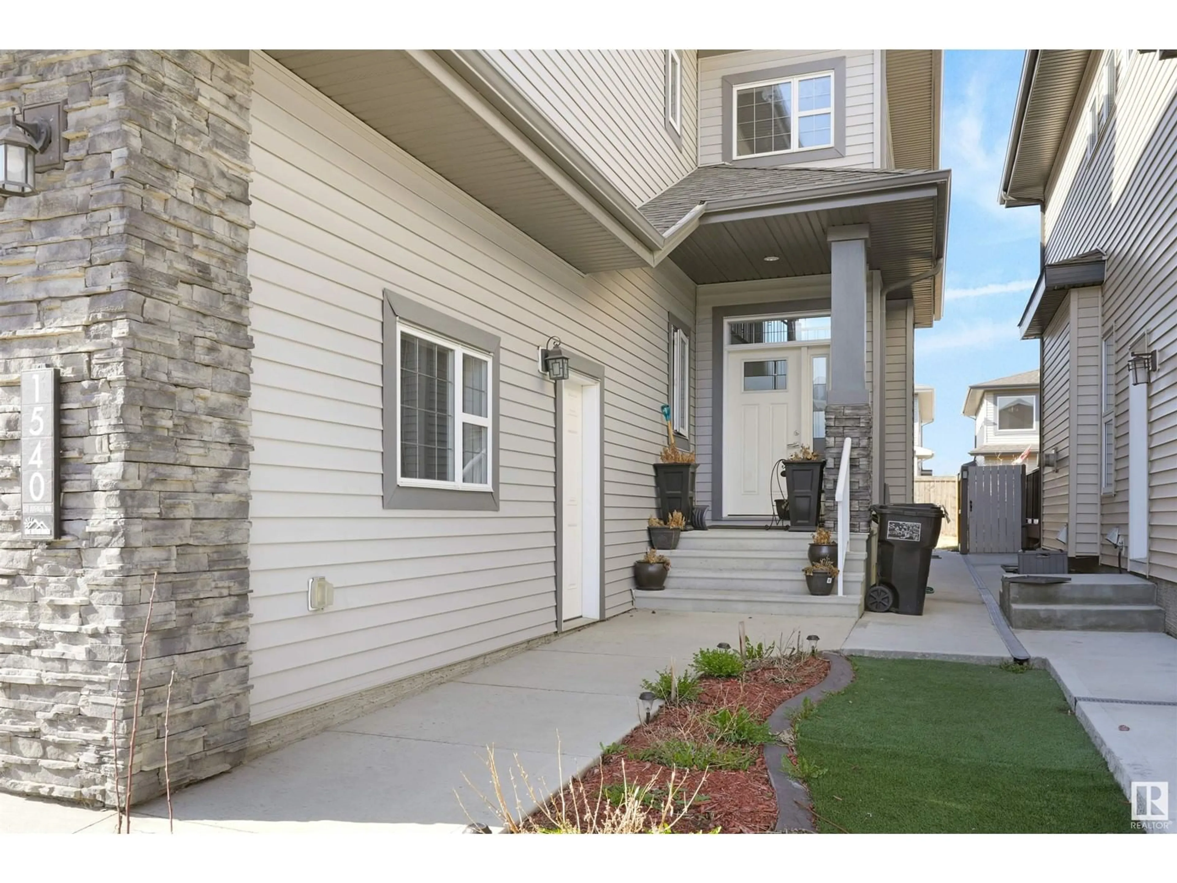 Frontside or backside of a home, the street view for 1540 151 AV NW, Edmonton Alberta T5Y3T4