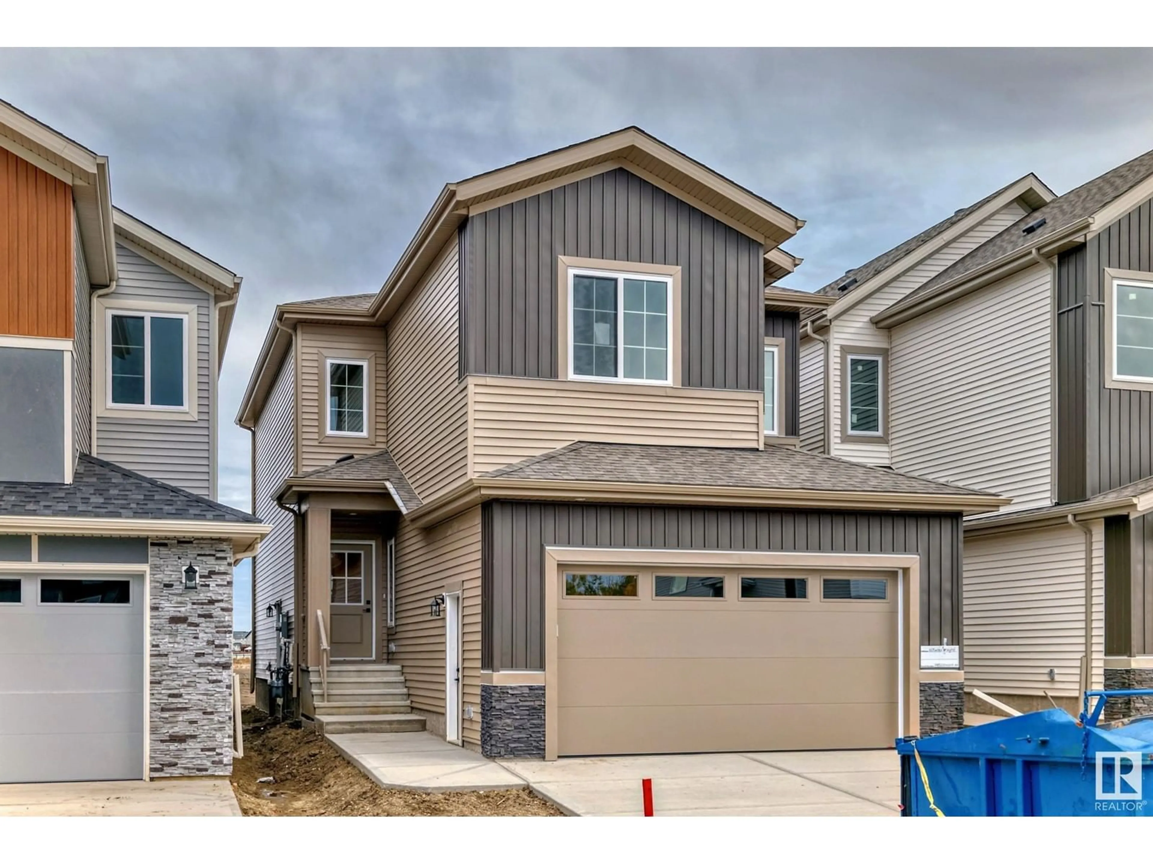 A pic from exterior of the house or condo, the street view for 107 Miller WD, Leduc Alberta T9E1R7