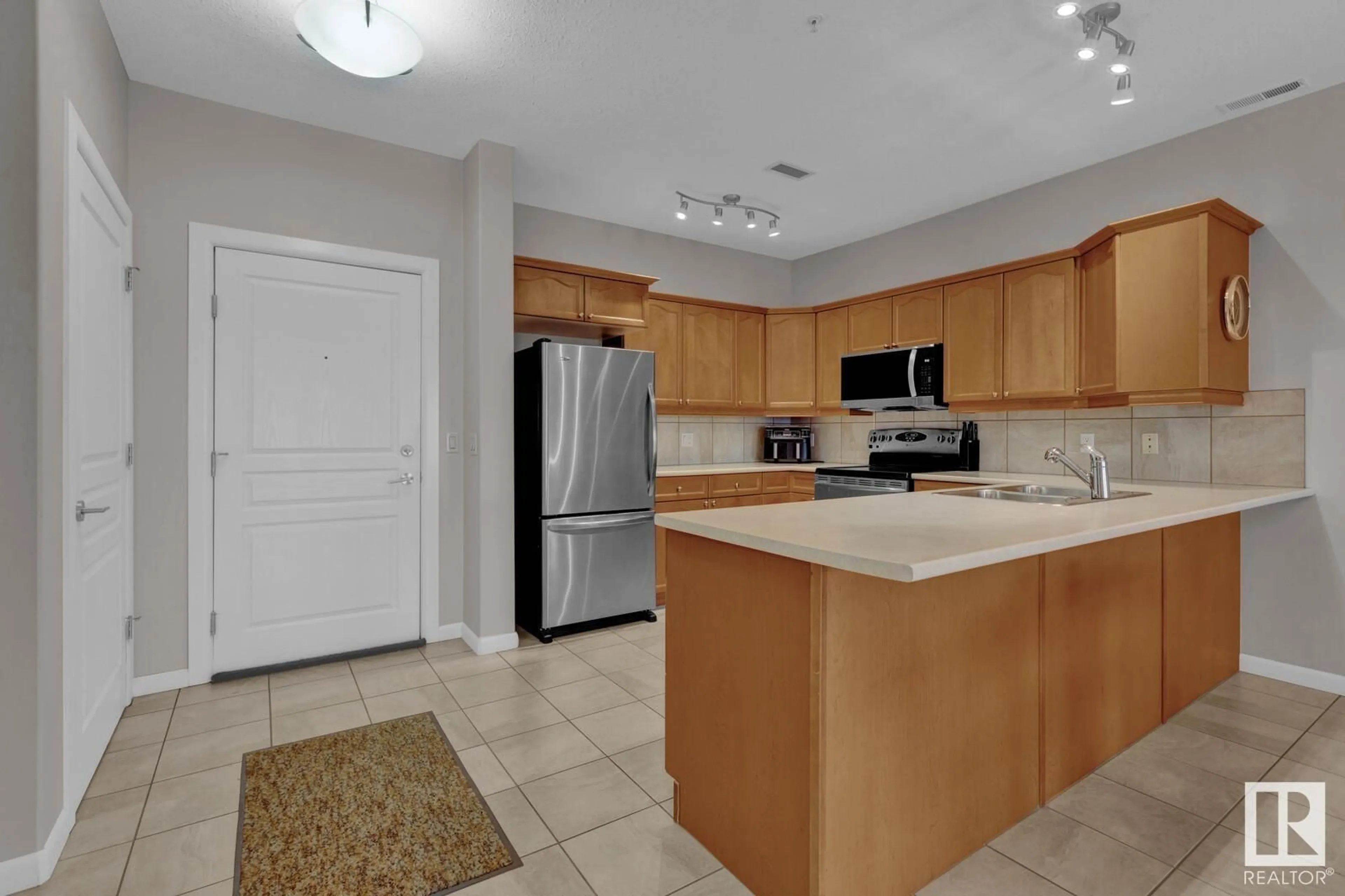 Standard kitchen, wood floors, cottage for #416 160 MAGRATH RD NW, Edmonton Alberta T6R3T7