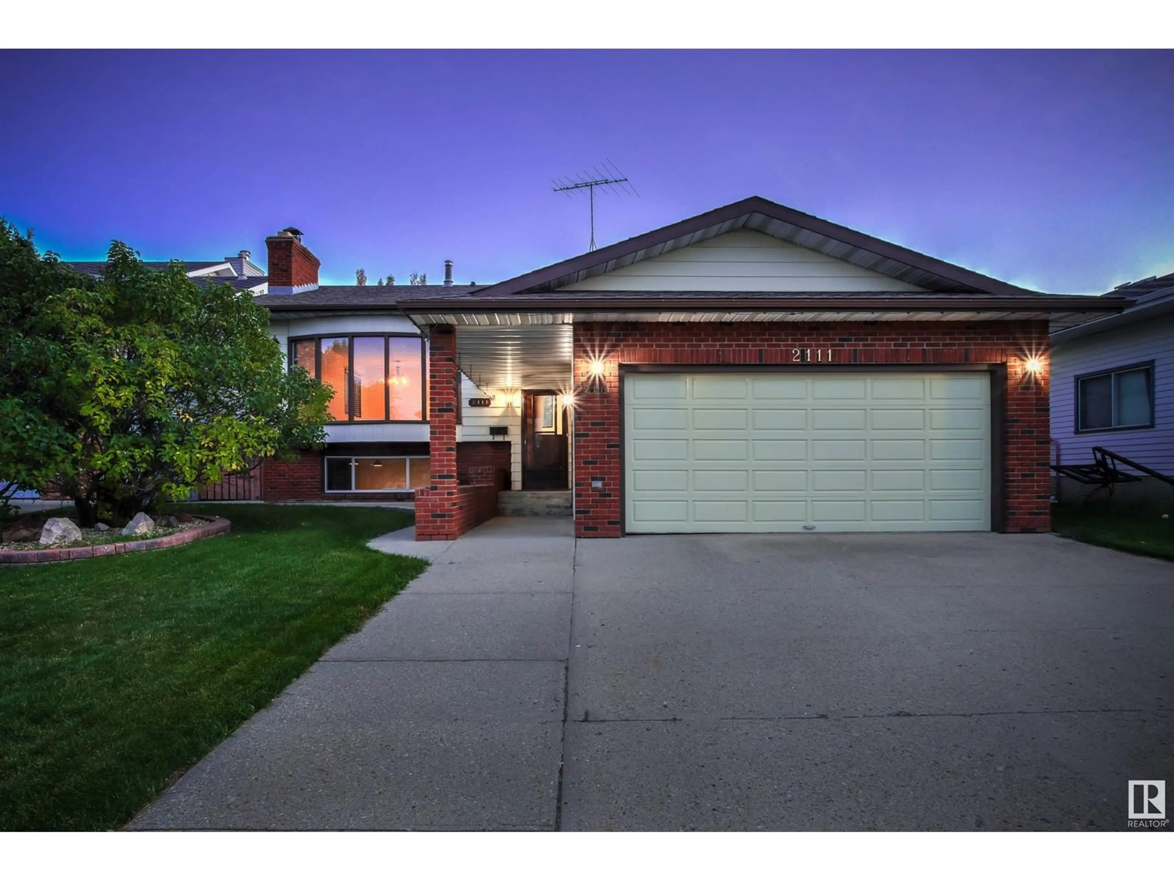 Frontside or backside of a home, the street view for 2111 104B ST NW, Edmonton Alberta T6R1V9