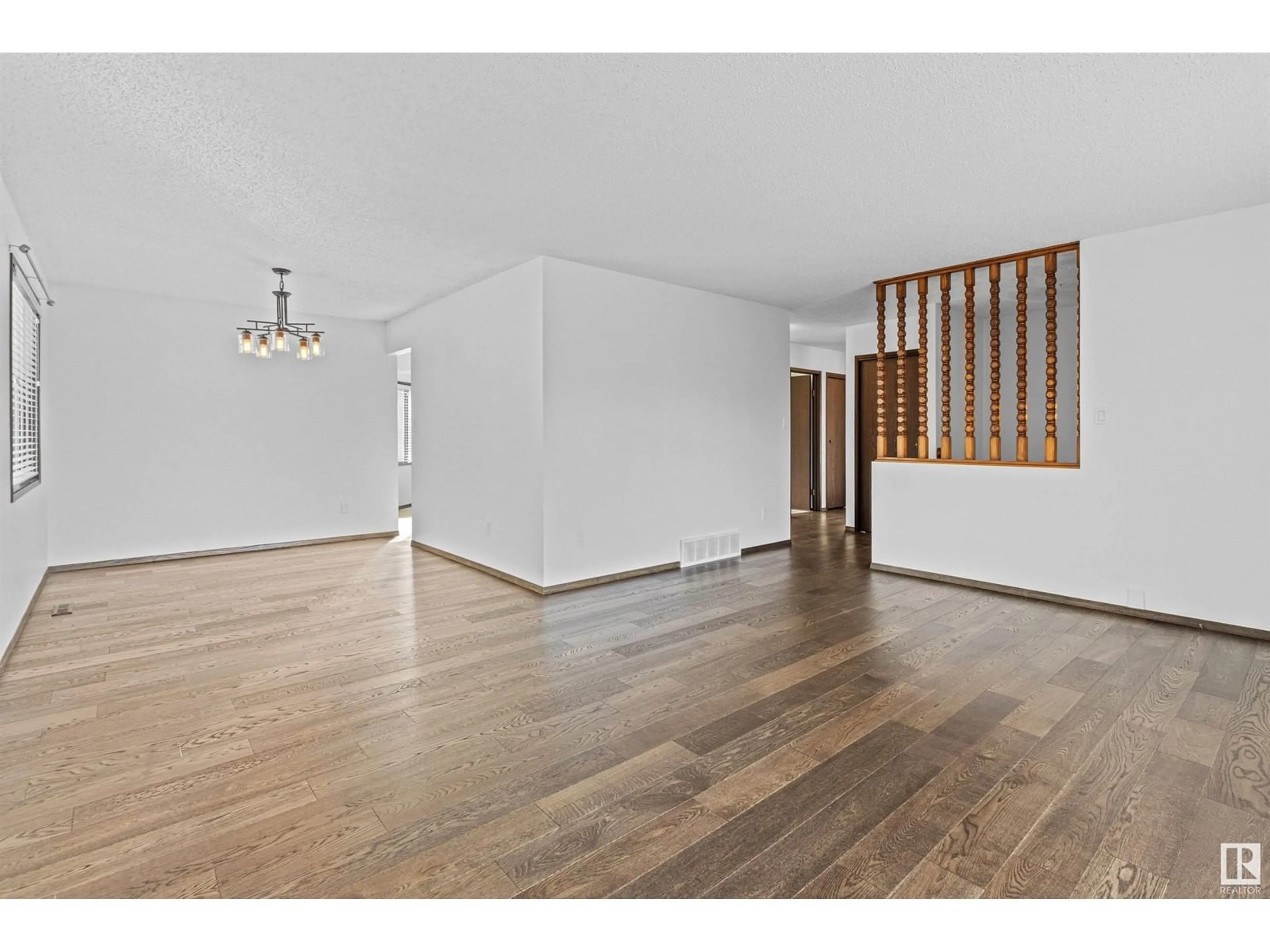 A pic of a room, wood floors for 2111 104B ST NW, Edmonton Alberta T6R1V9