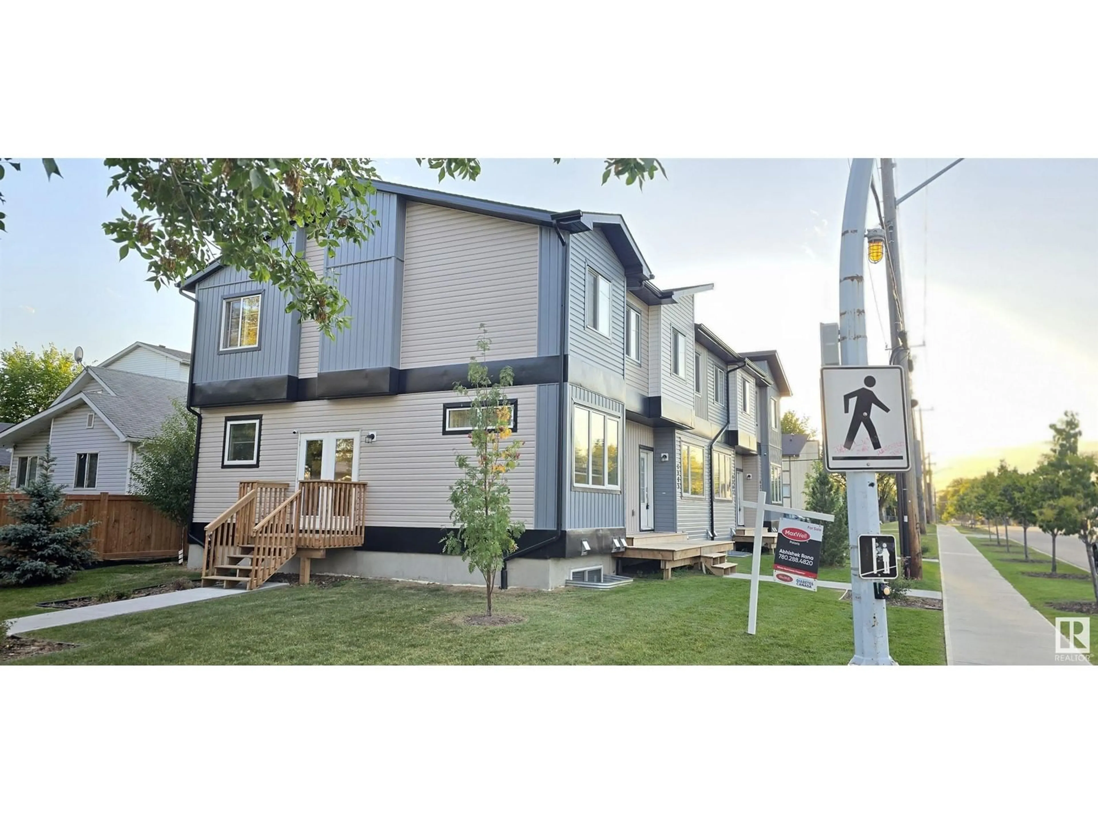 A pic from exterior of the house or condo, the street view for 8003/5/7/9 120 Ave AV NW NW, Edmonton Alberta T5B2N7