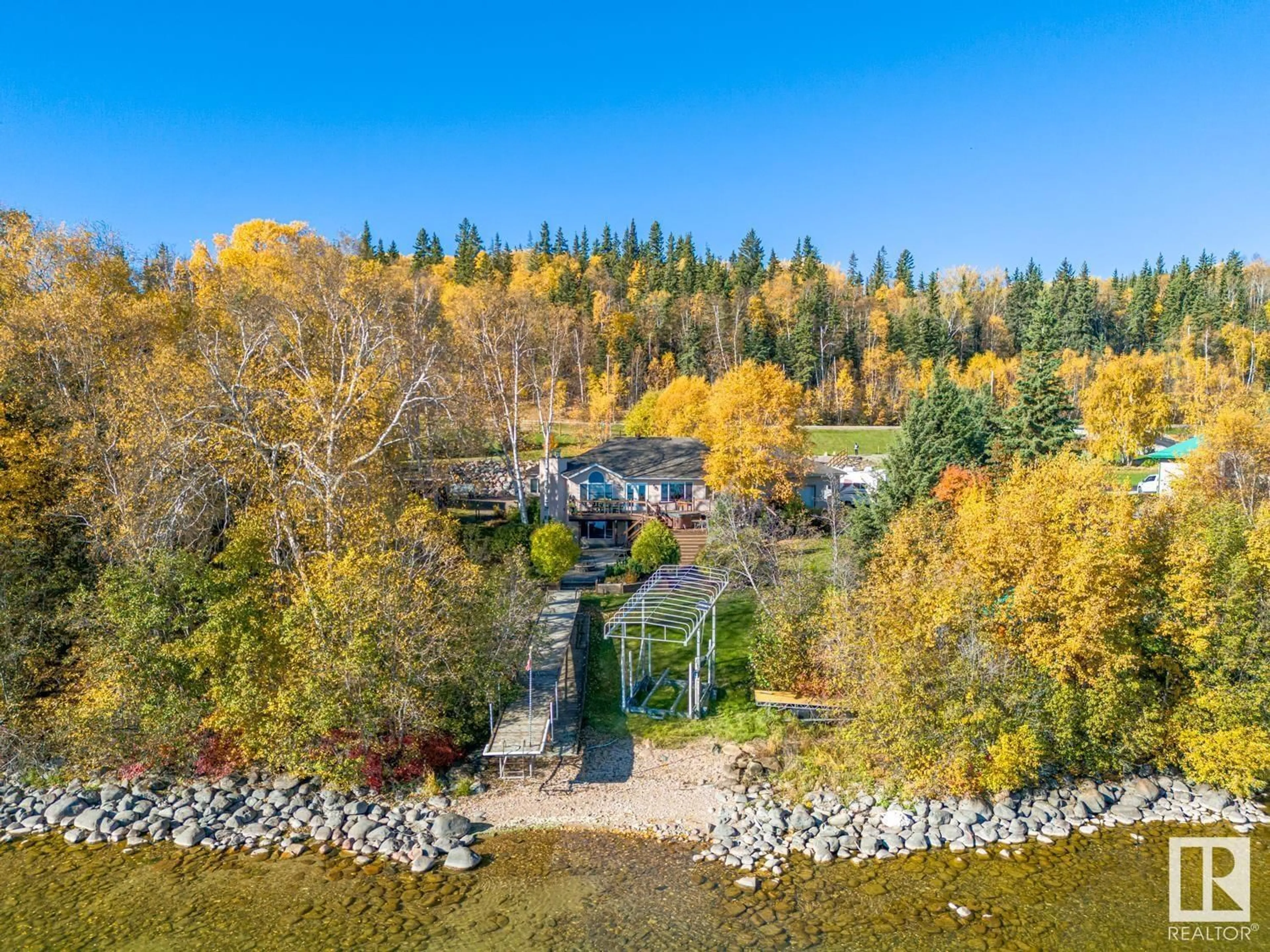 A pic from outside/outdoor area/front of a property/back of a property/a pic from drone, forest/trees view for 65311 - 33 RR 420, Rural Bonnyville M.D. Alberta T9M0P2