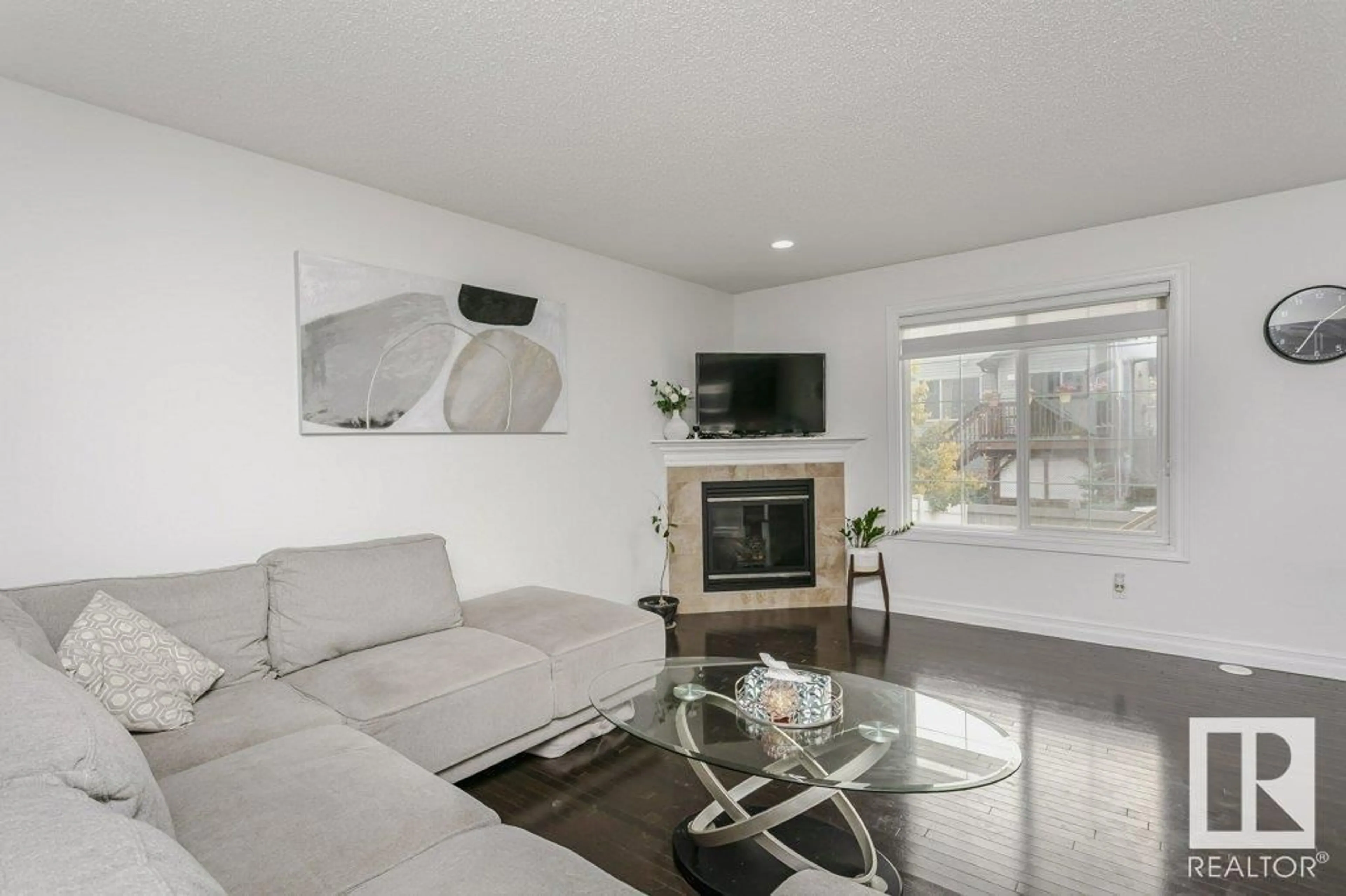 Living room, wood floors for #20 5317 3 AV SW, Edmonton Alberta T6X0W7