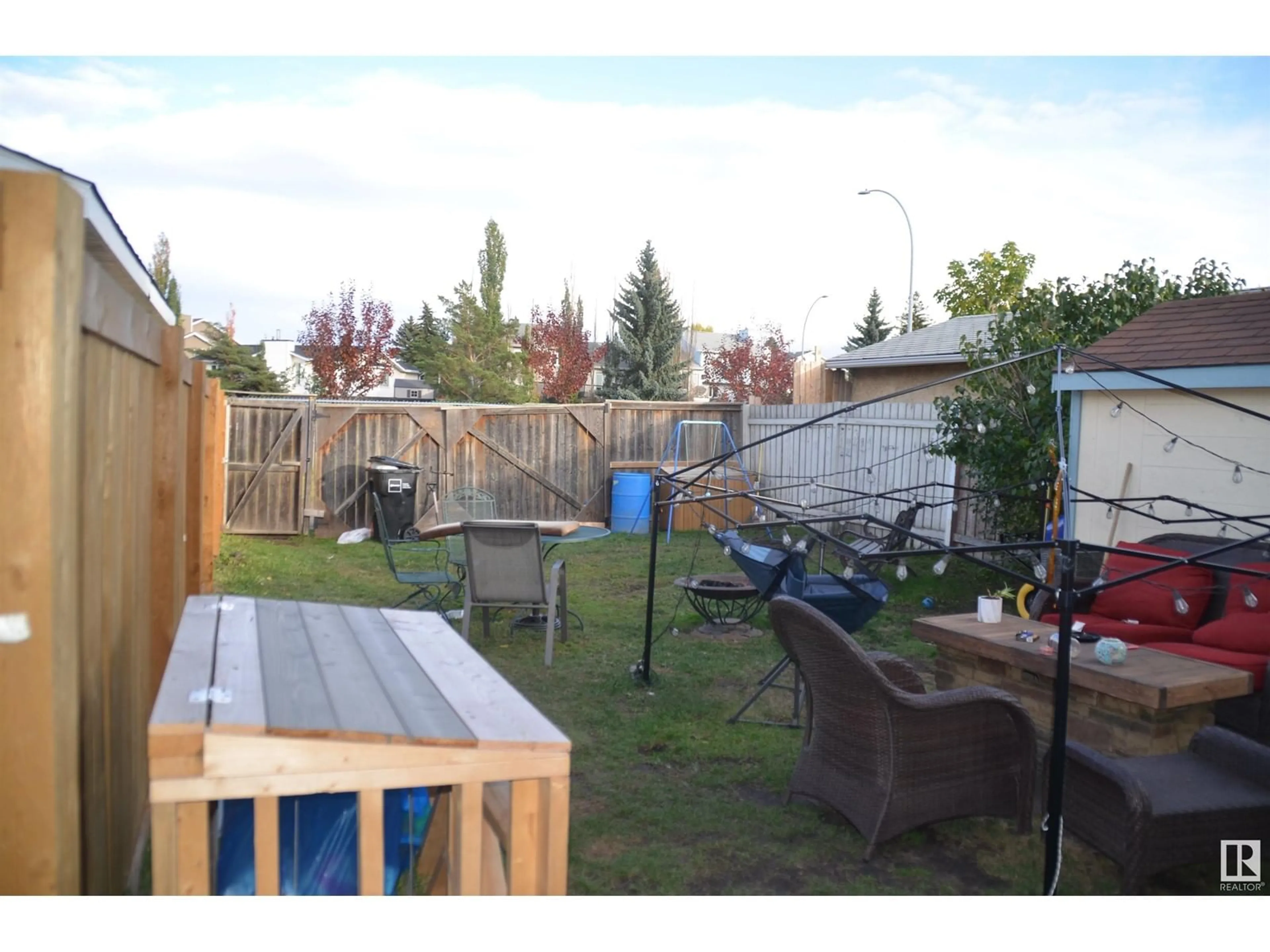 Patio, the fenced backyard for 4211 35 ST NW, Edmonton Alberta T6L5A3