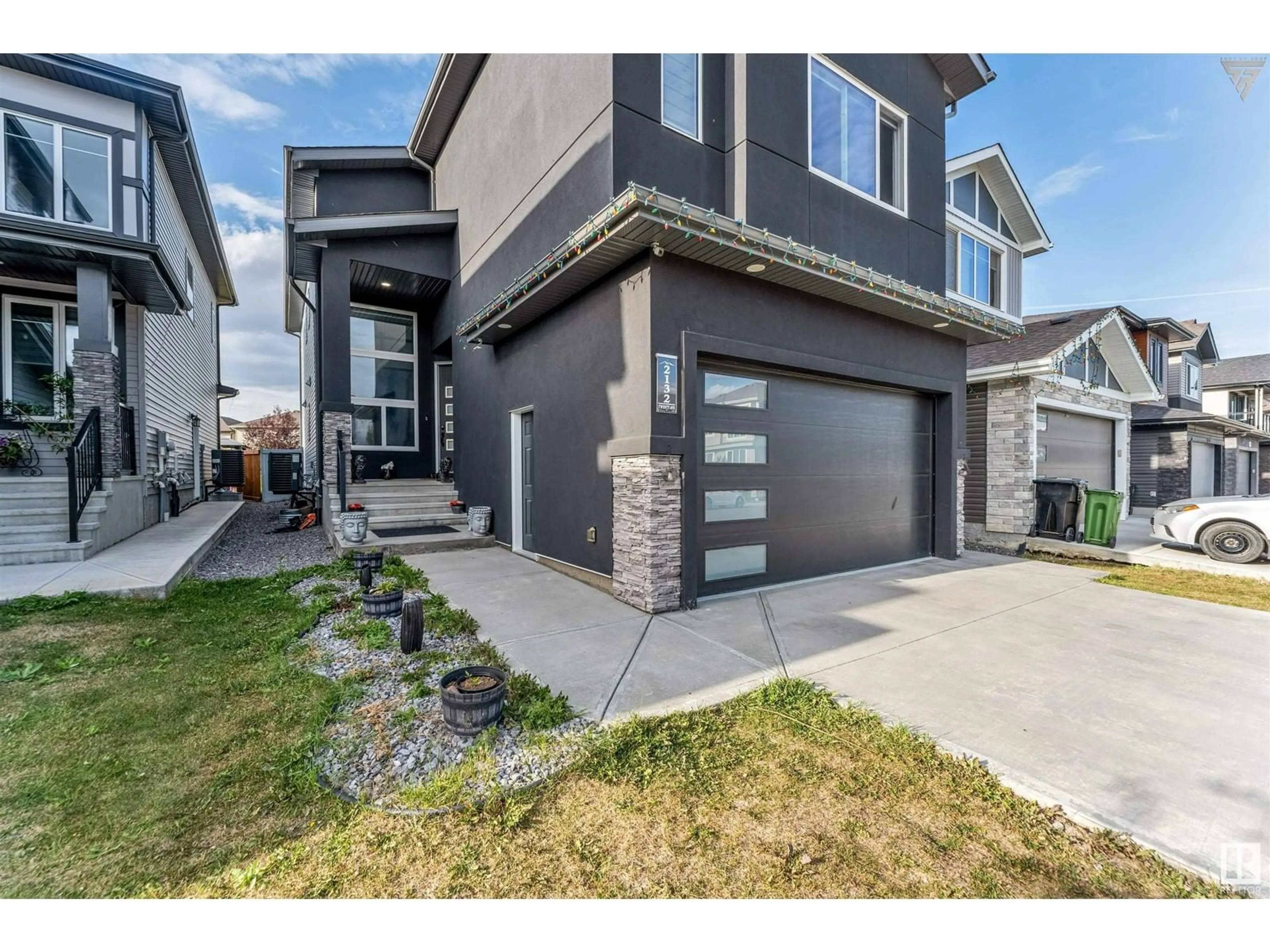 Frontside or backside of a home, the street view for 2132 20 AV NW, Edmonton Alberta T6T2L2