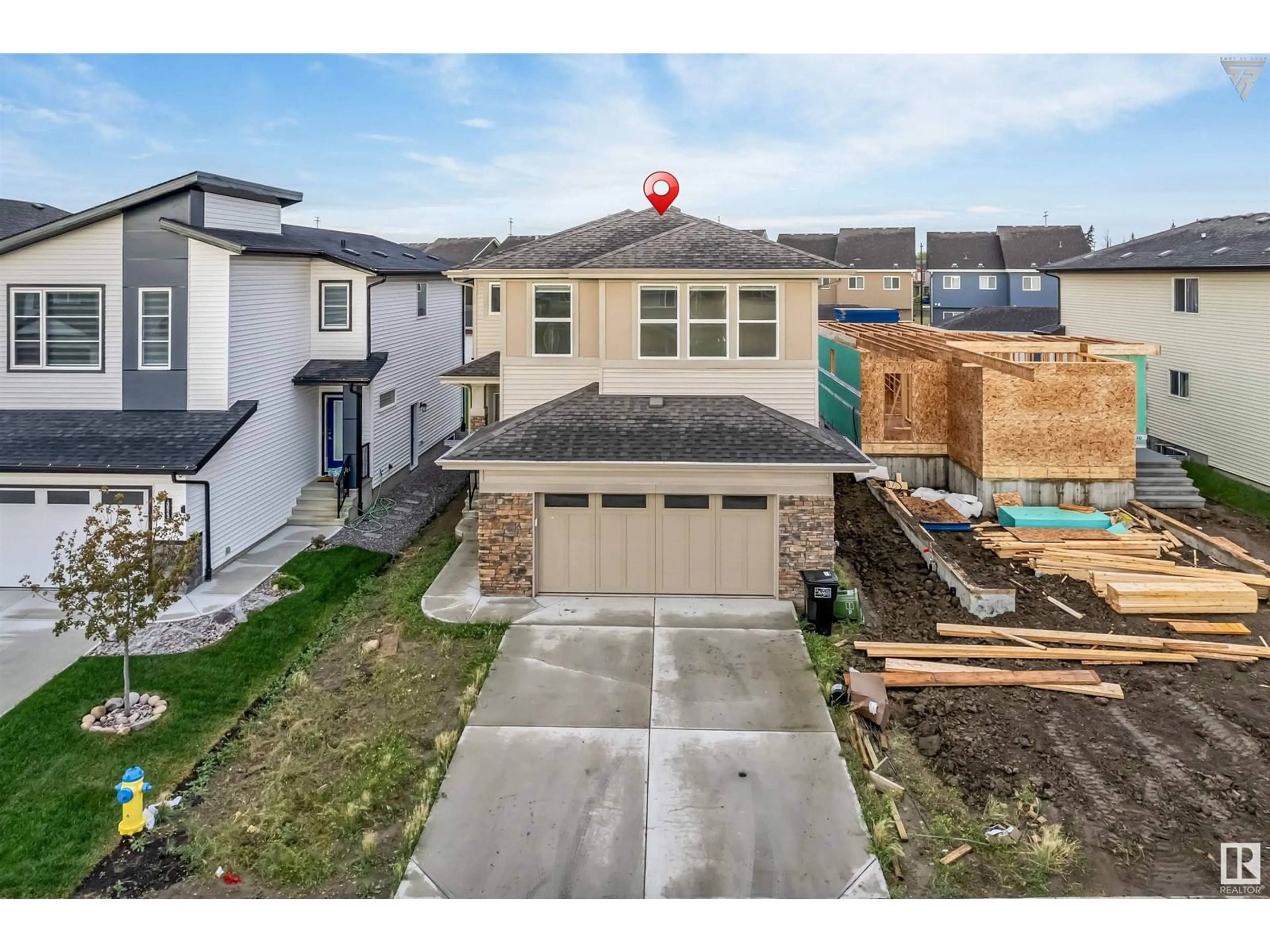 Frontside or backside of a home, the fenced backyard for 3519 6 ST NW, Edmonton Alberta T6T2L5