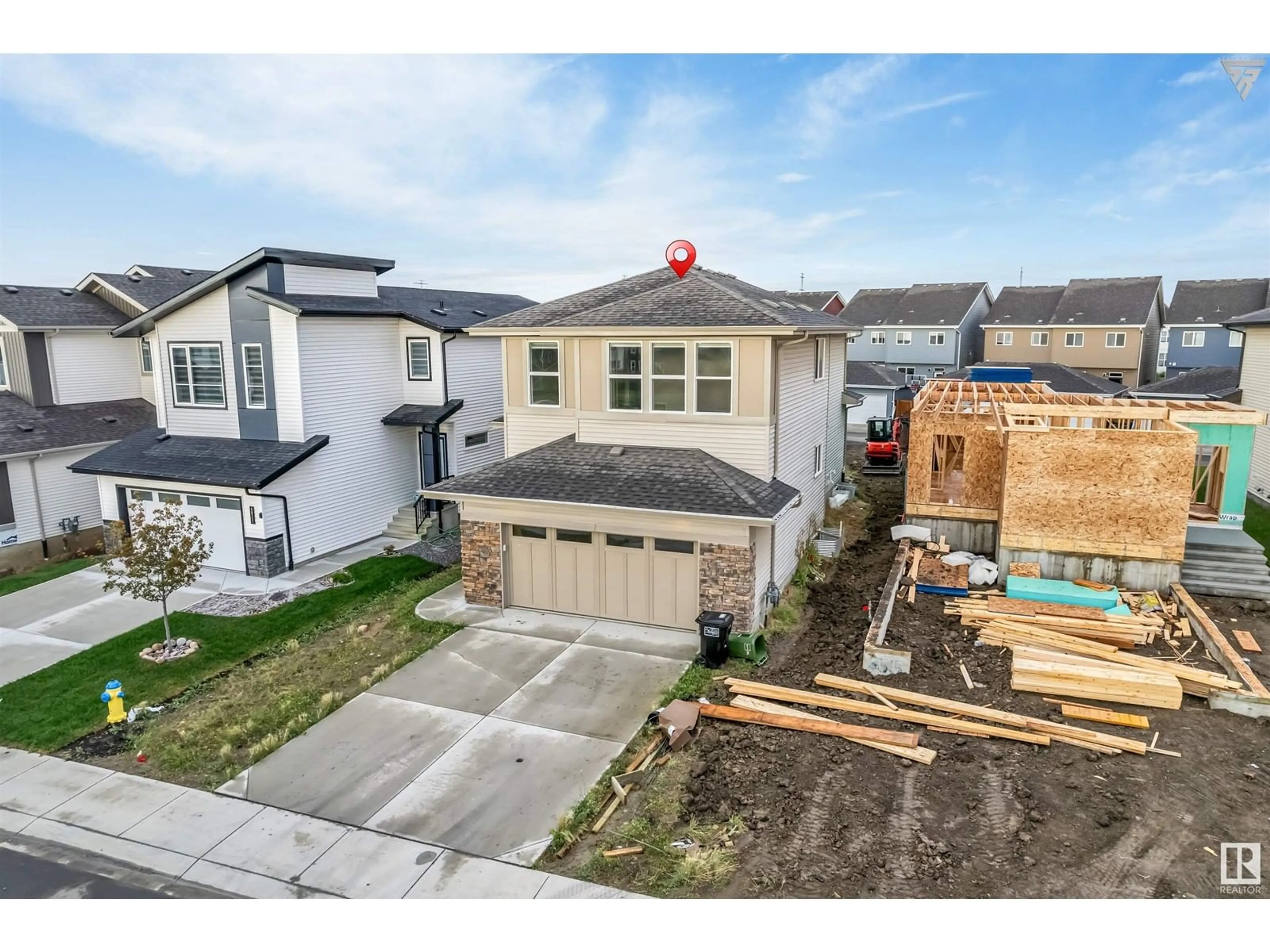 Frontside or backside of a home, the fenced backyard for 3519 6 ST NW, Edmonton Alberta T6T2L5