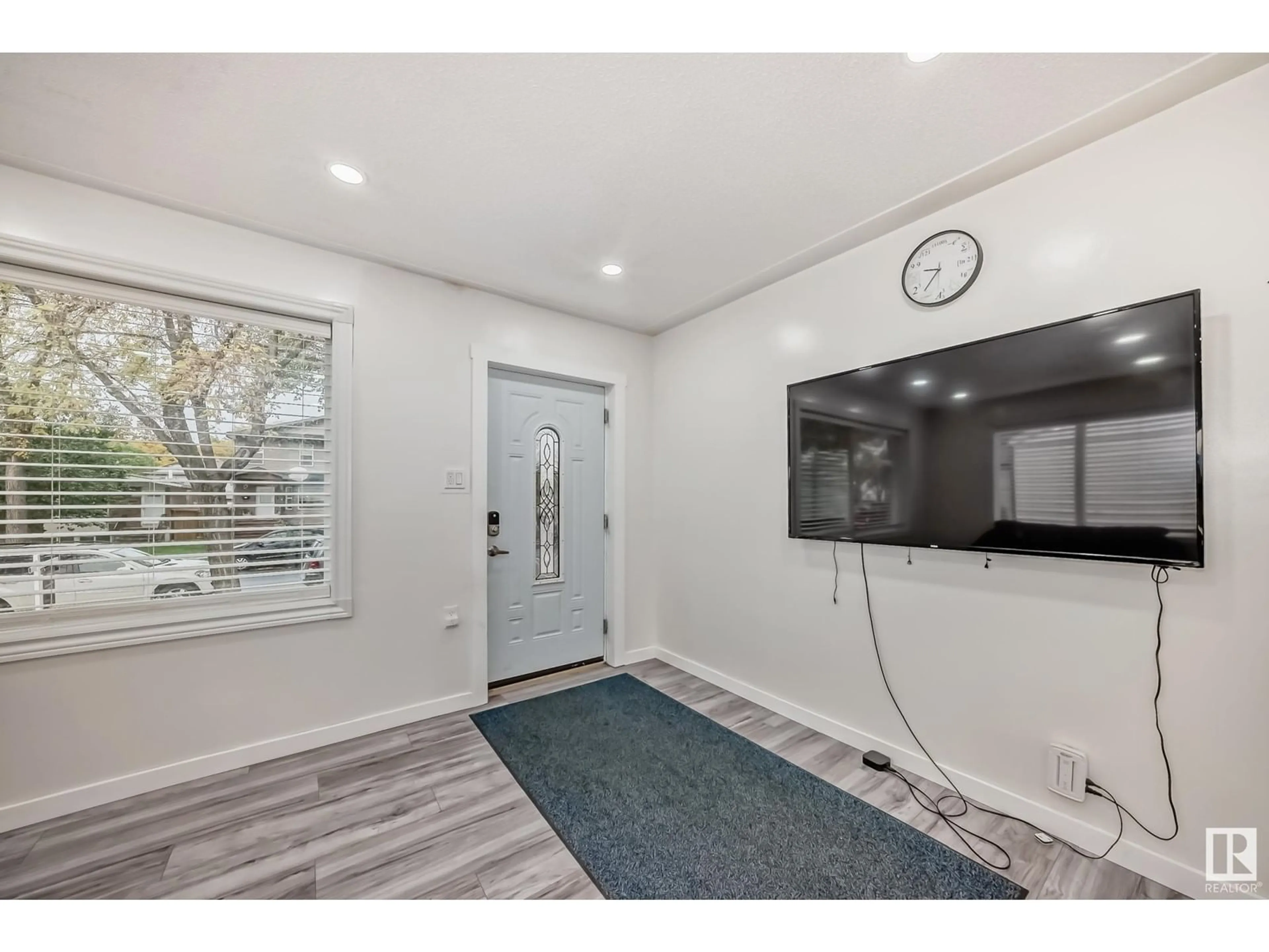 Indoor entryway, wood floors for 12835 122 ST NW, Edmonton Alberta T5L0E6