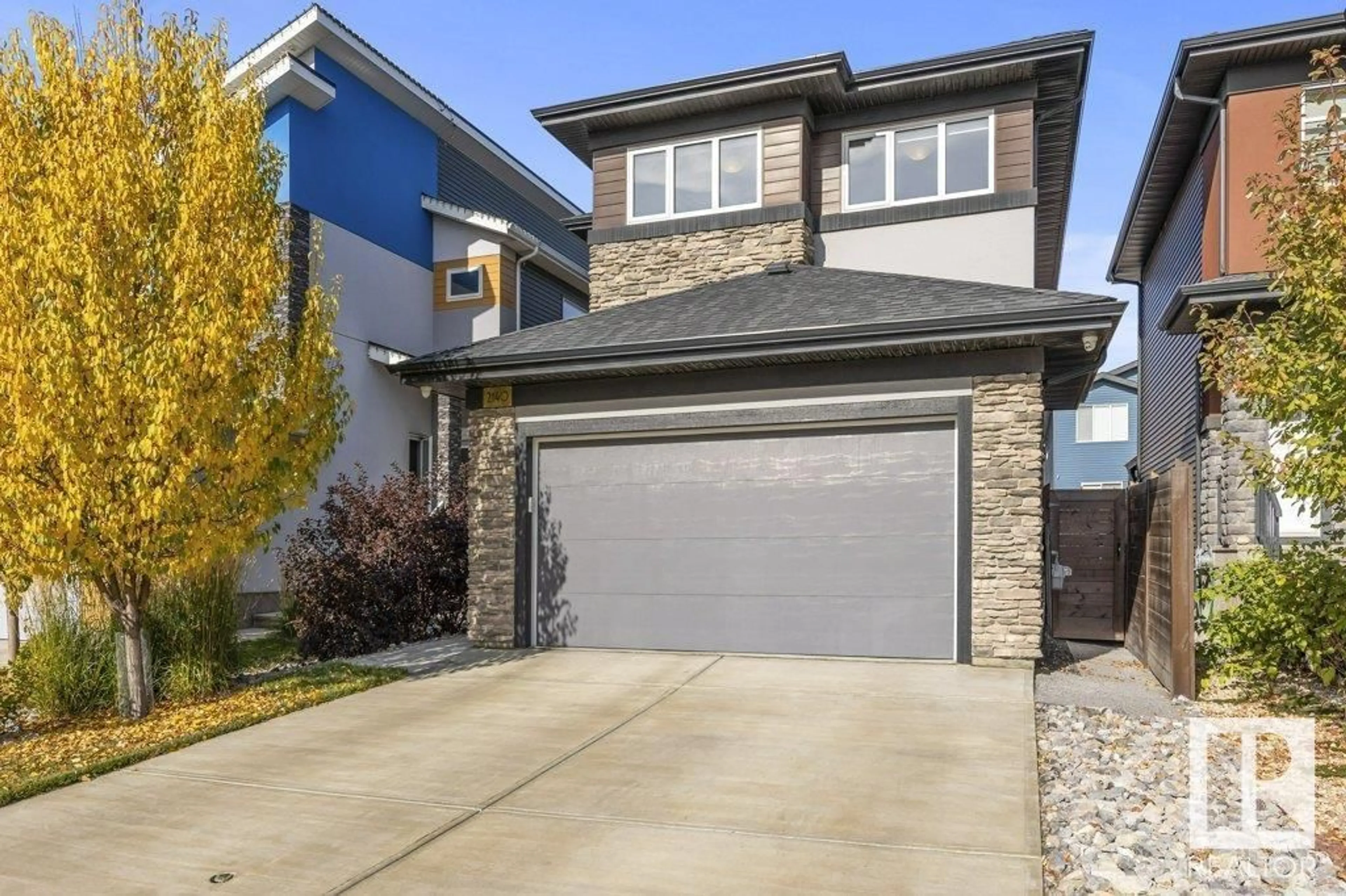 Frontside or backside of a home, the street view for 2140 KOSHAL WY SW, Edmonton Alberta T6W3R9