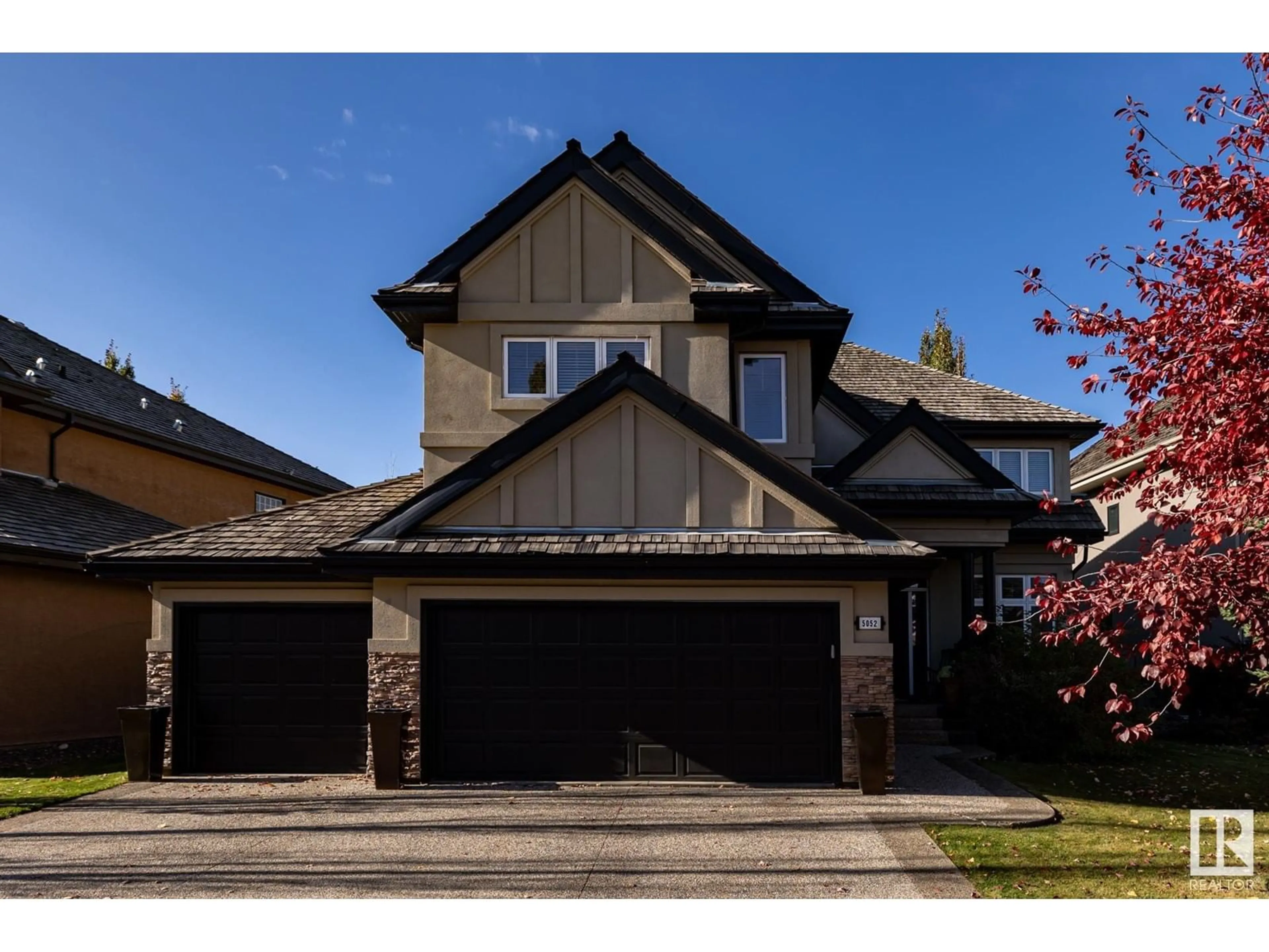 Frontside or backside of a home, the street view for 5052 MCLUHAN RD NW, Edmonton Alberta T6R0J4