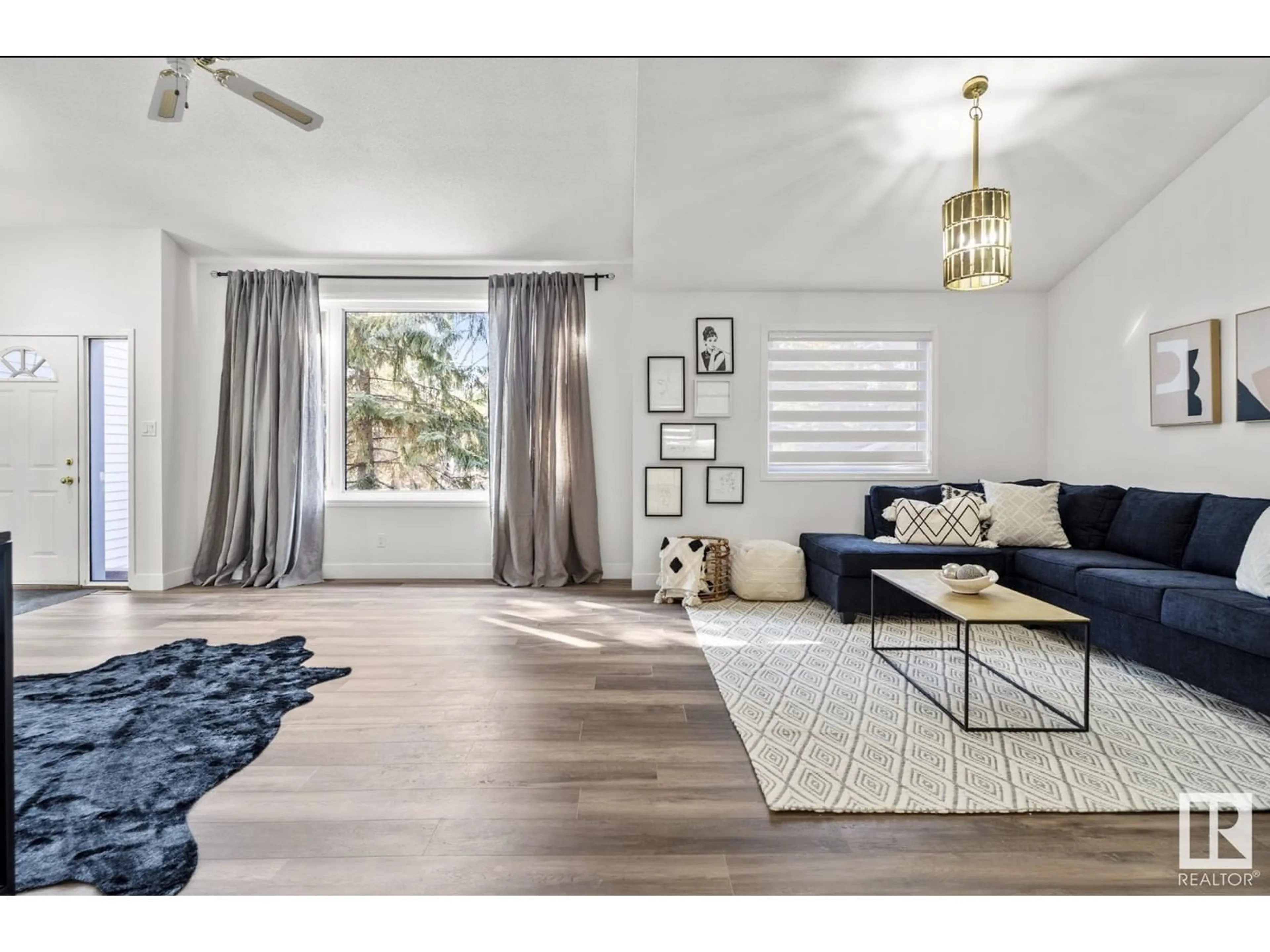 Living room, wood floors for 2711 34 ST SW, Edmonton Alberta T6X1A5