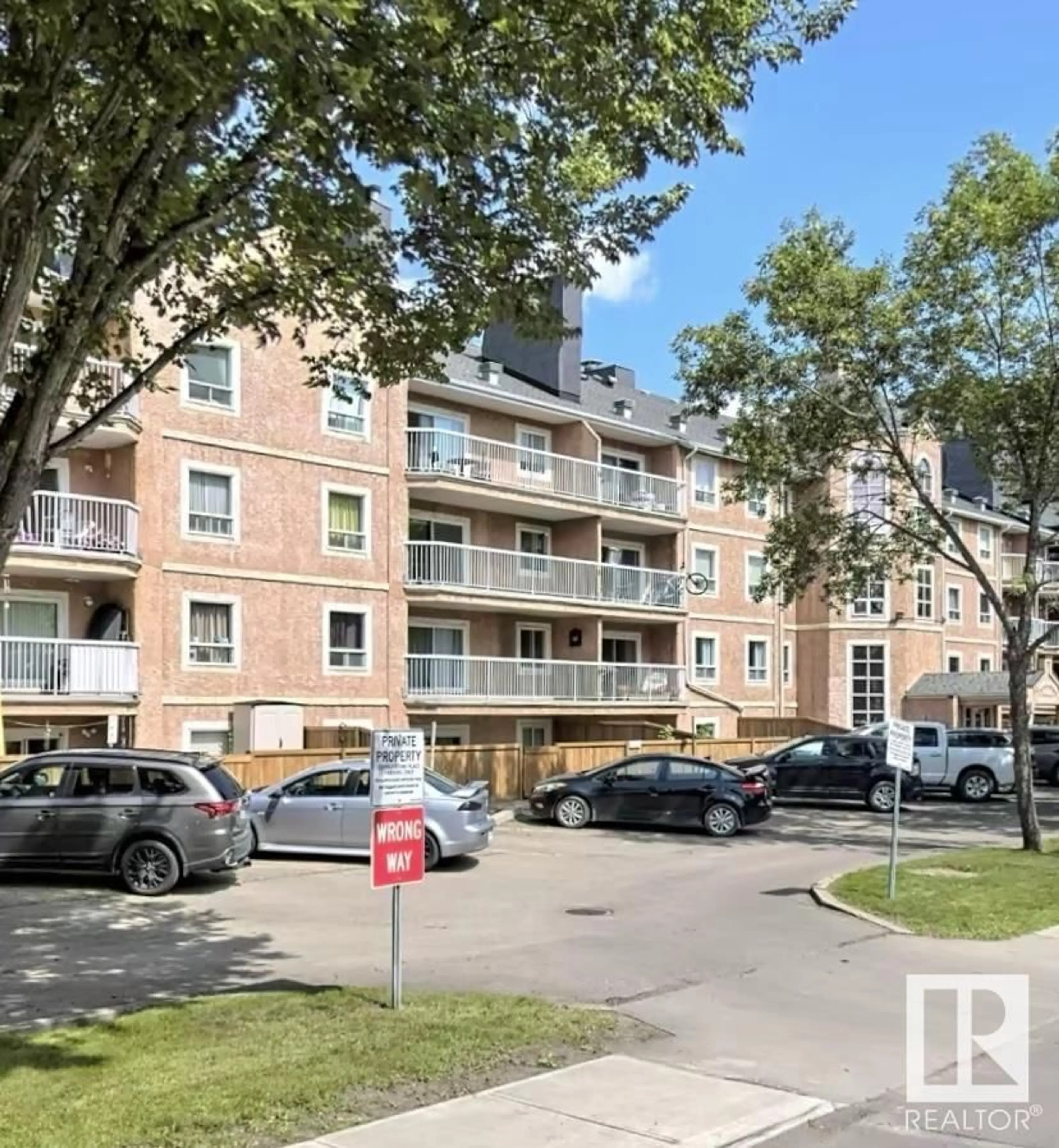 A pic from exterior of the house or condo, the street view for #114 9010 106 AV NW, Edmonton Alberta T5H4K3